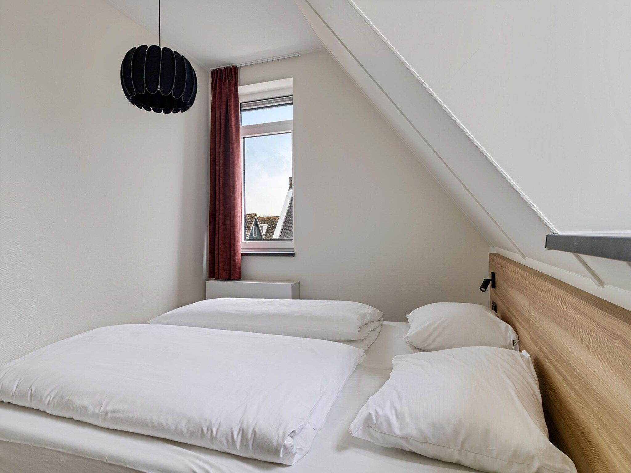 Een slaapkamer van Dijkhuys in PS Opperdoes