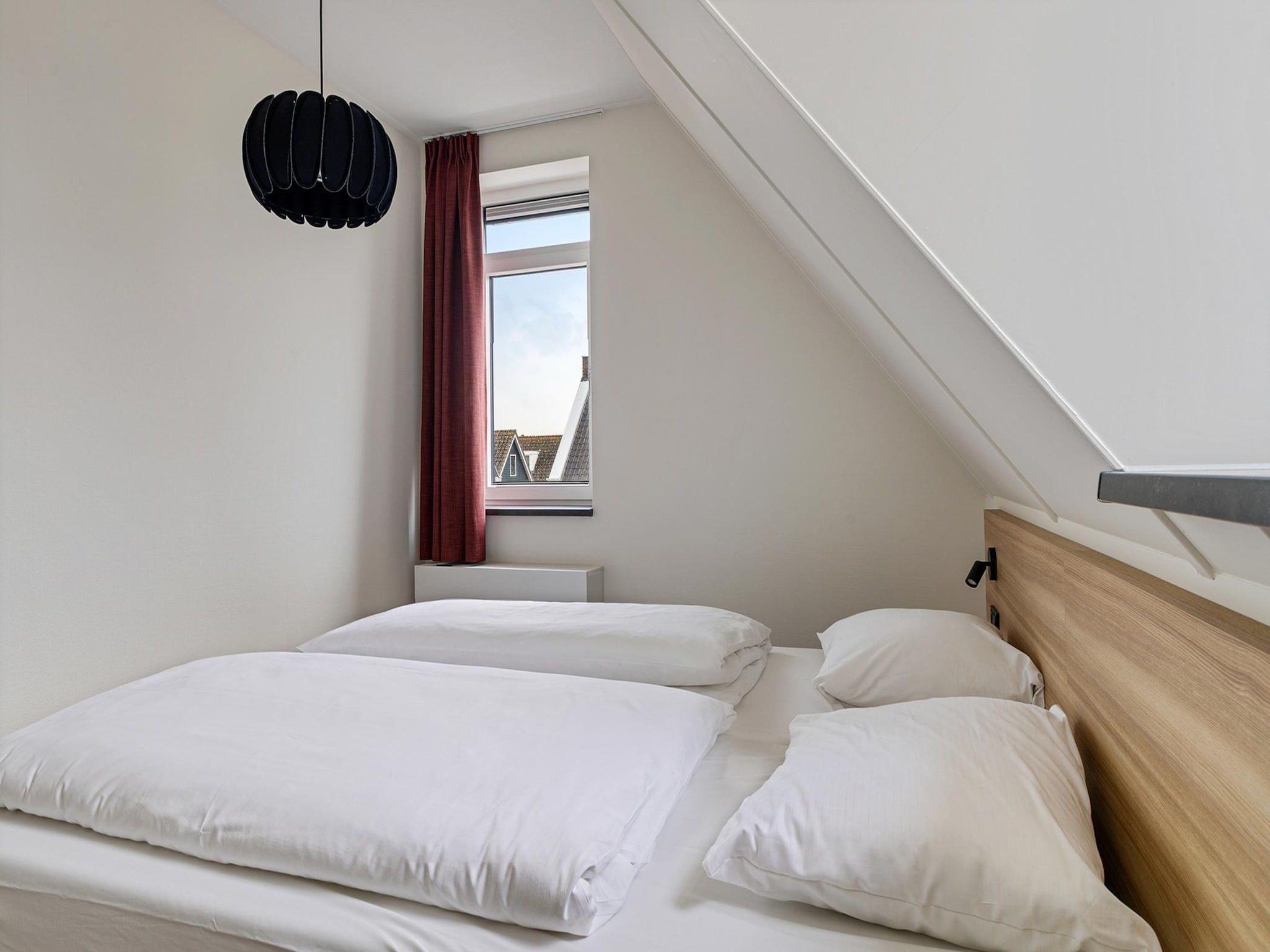 Een slaapkamer van Dijkhuys Binnen in PS Opperdoes