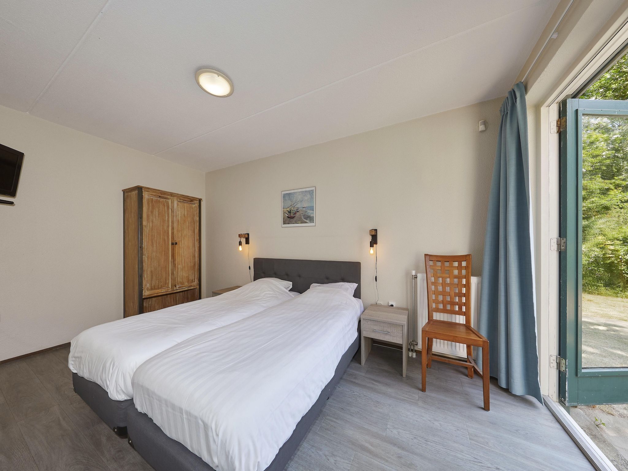 Een slaapkamer van Vakantiepark Kijkduin 6 in Den Haag