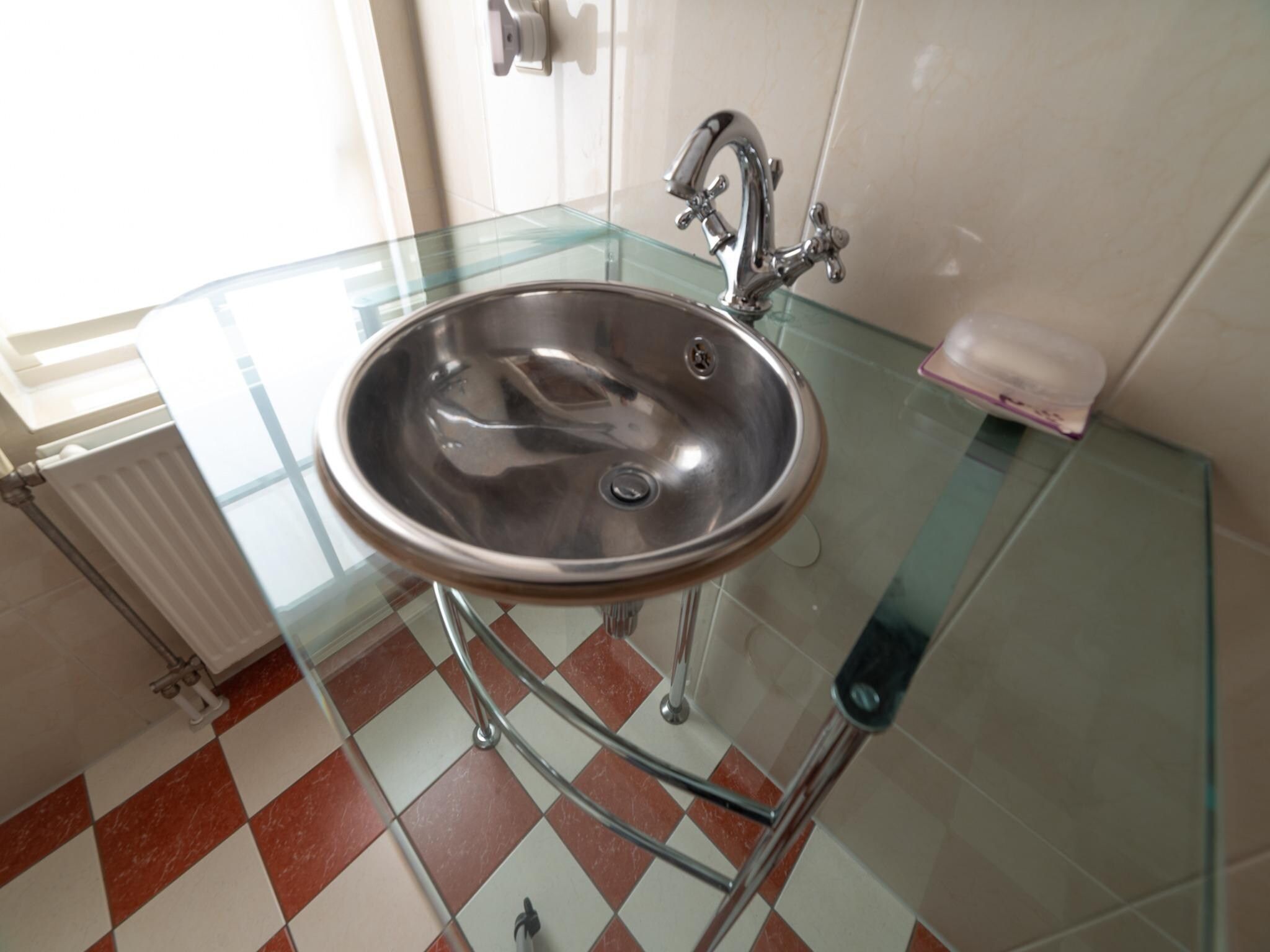 De badkamer van Villapark De Oesterbaai 134 in Wemeldinge