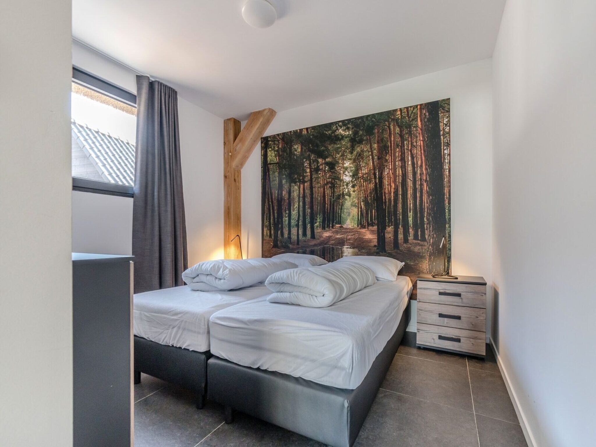 Een slaapkamer van Farm Lodge 670 in Baarle-nassau