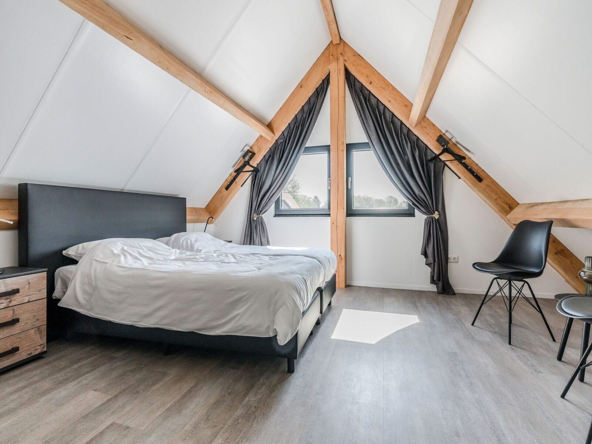 Een slaapkamer van Farm Lodge 670 in Baarle-nassau