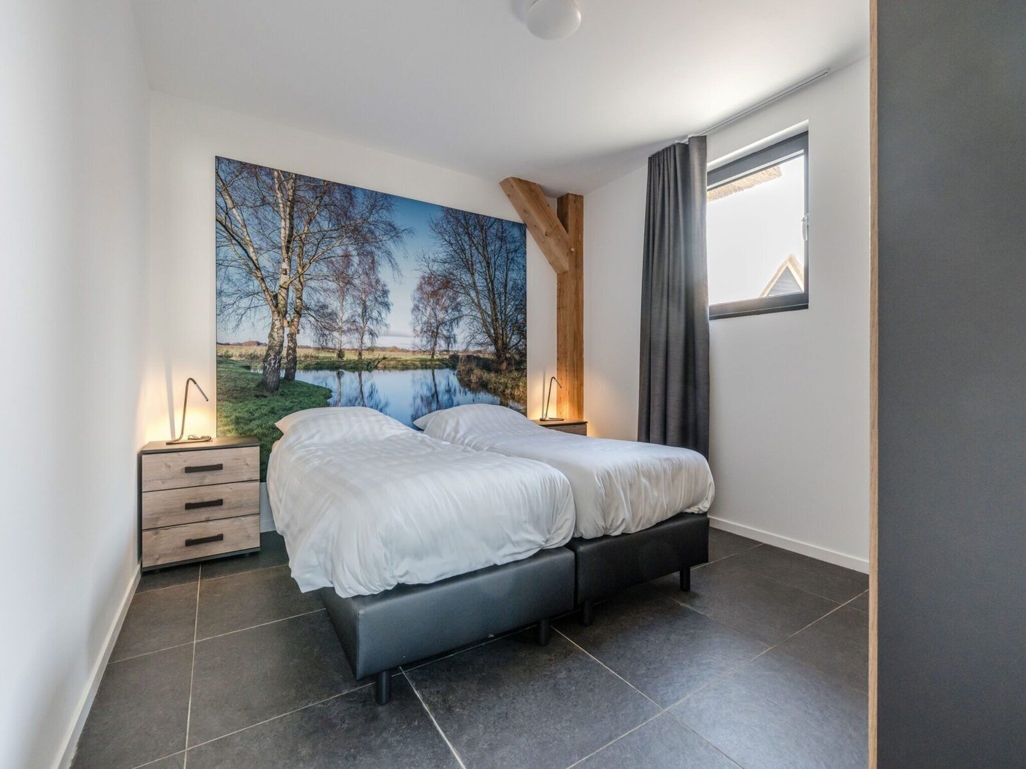 Een slaapkamer van Farm Lodge 670 in Baarle-nassau