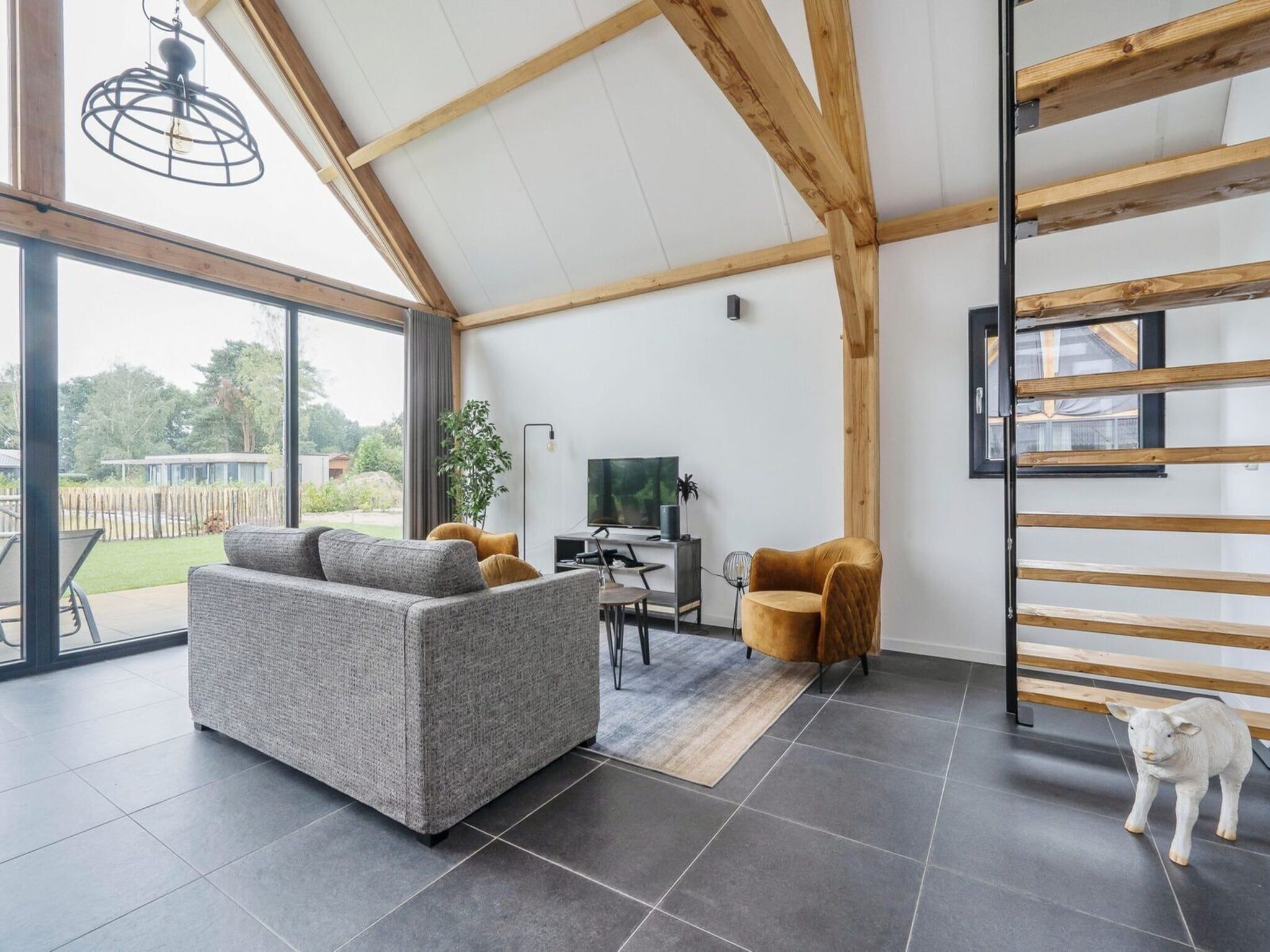 De woonkamer van Farm Lodge 687 in Baarle-nassau