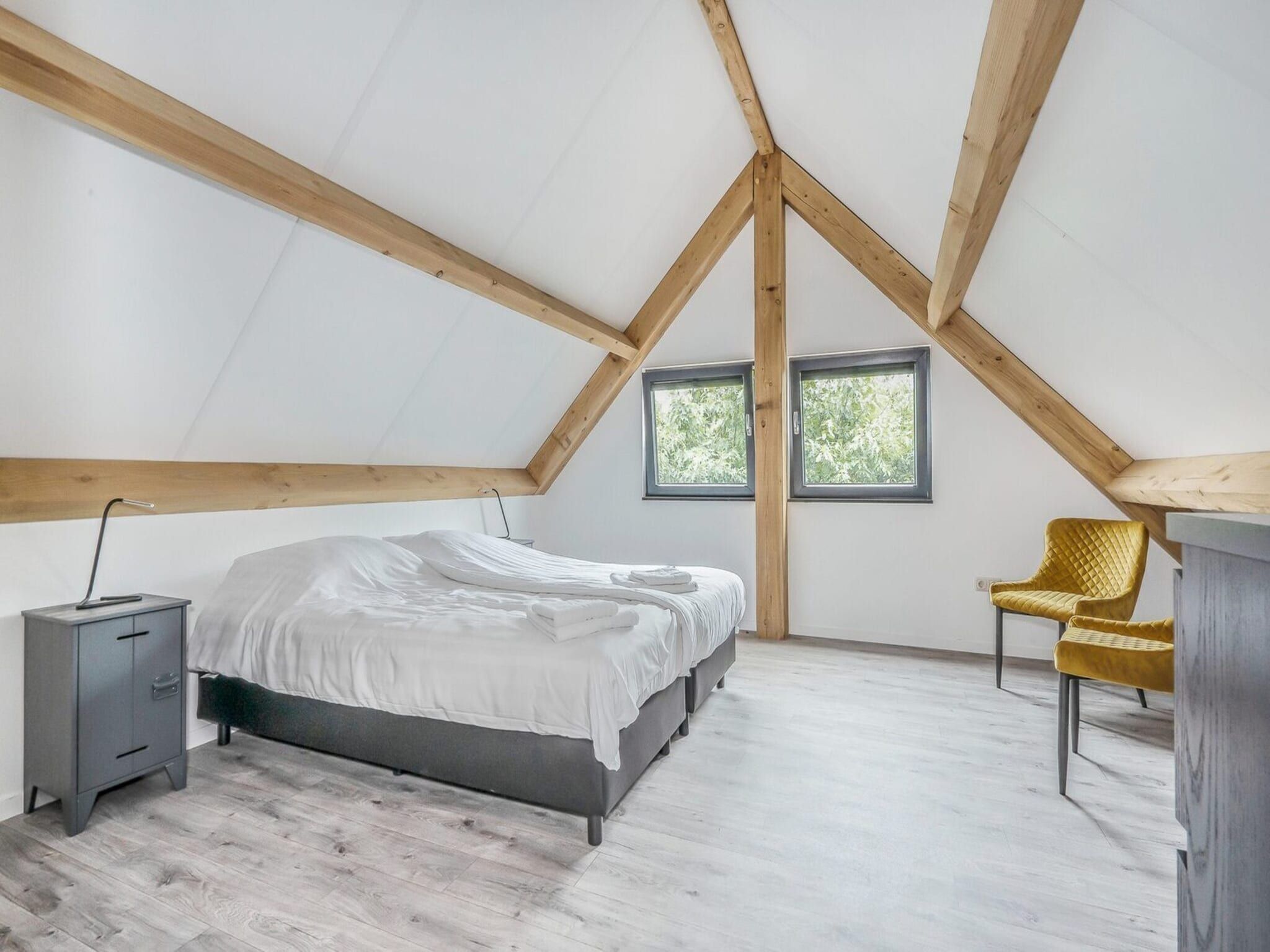 Een slaapkamer van Farm Lodge 687 in Baarle-nassau