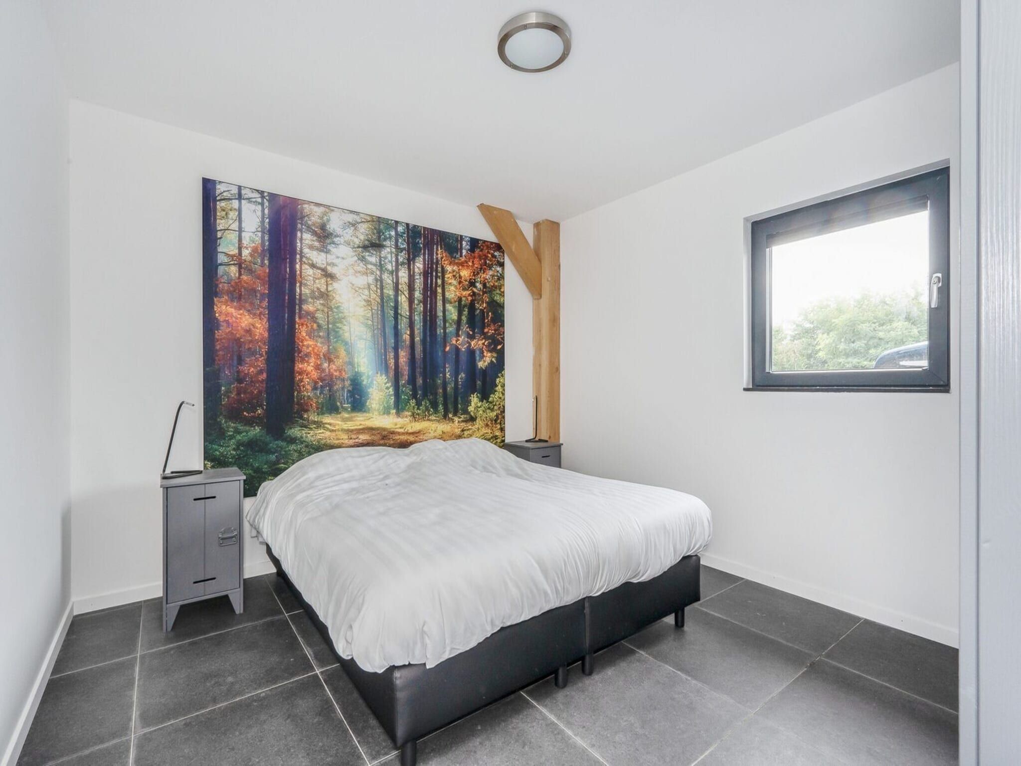 Een slaapkamer van Farm Lodge 687 in Baarle-nassau