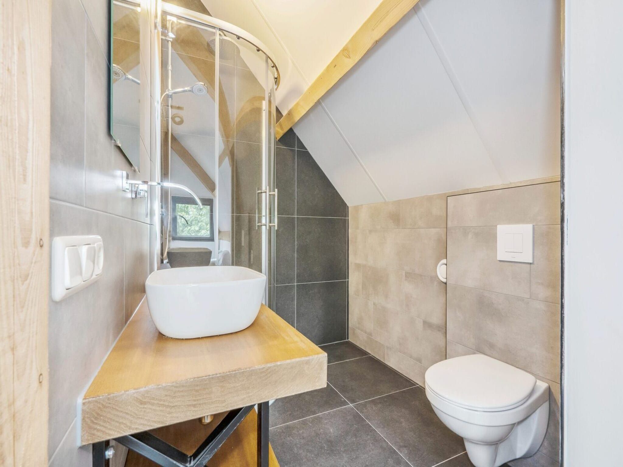 Een slaapkamer van Farm Lodge 687 in Baarle-nassau