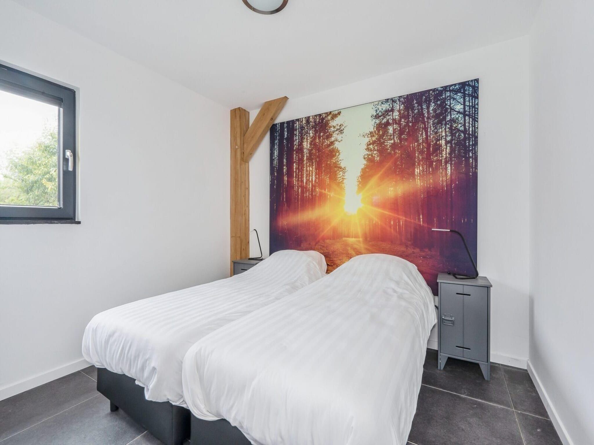 Een slaapkamer van Farm Lodge 687 in Baarle-nassau