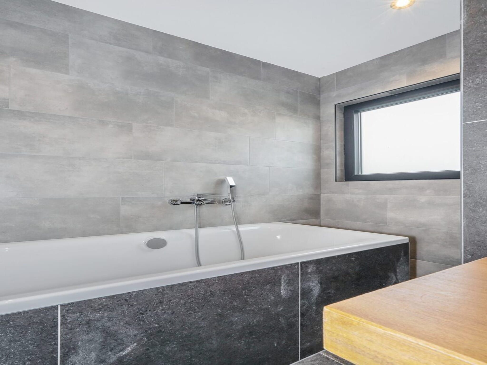 De badkamer van Farm Lodge 687 in Baarle-nassau