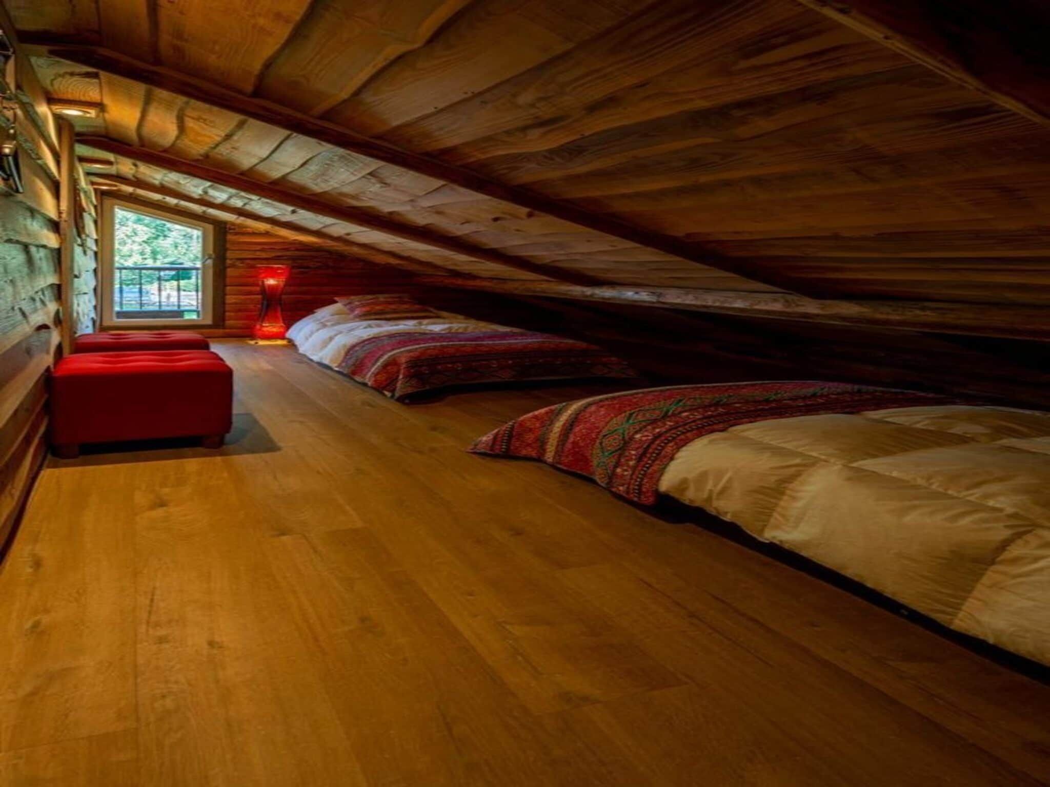 Een slaapkamer van Paalchalet 723 in Baarle-nassau