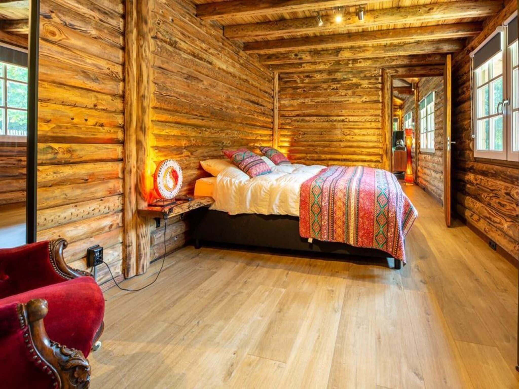 Een slaapkamer van Paalchalet 723 in Baarle-nassau