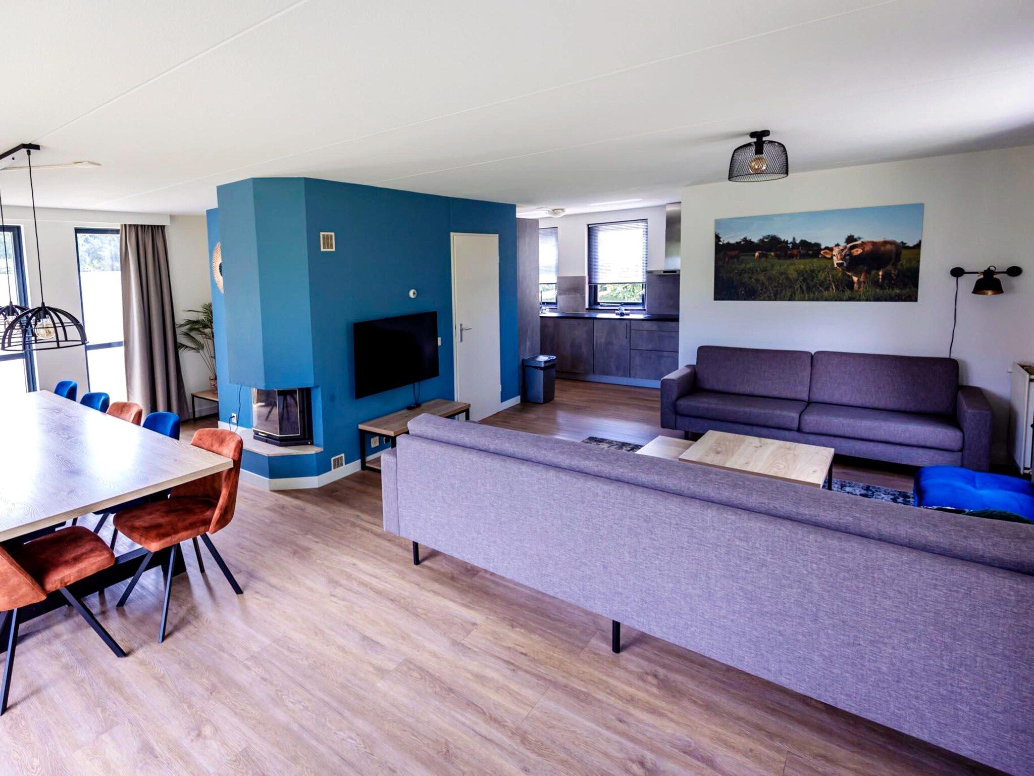 De woonkamer van 8 - Persons Family bungalow in Ewijk