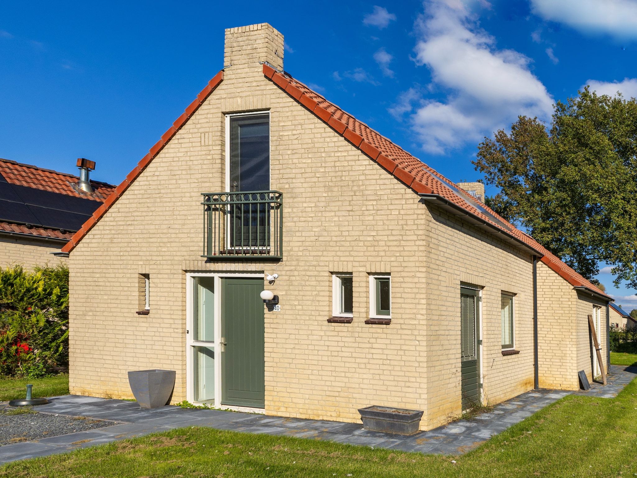 De buitenkant van 6 - Persons Forest Bungalow (copy) in Ewijk