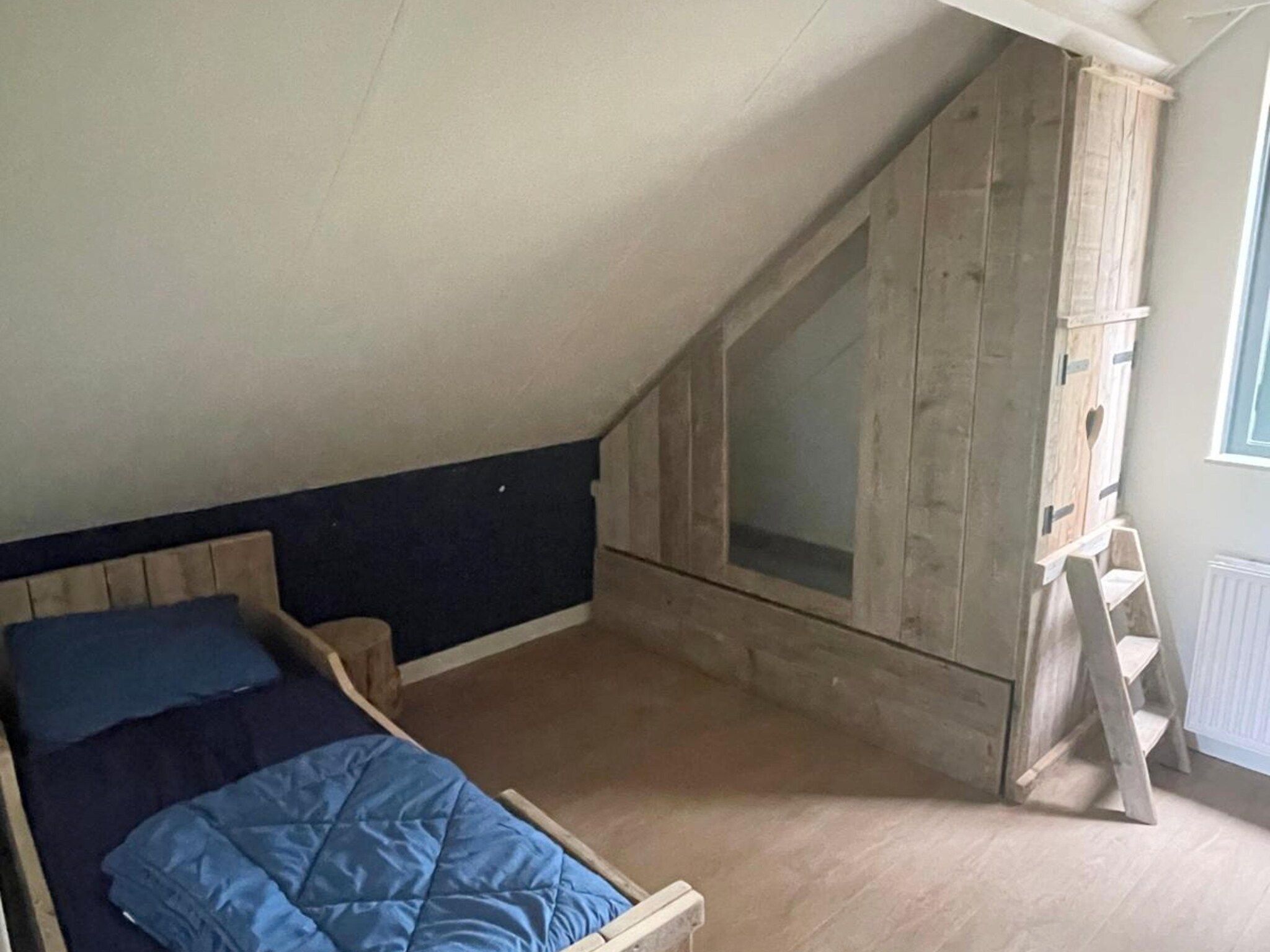 Een slaapkamer van 6 - Persons Lakeside Bungalow (copy) in Ewijk