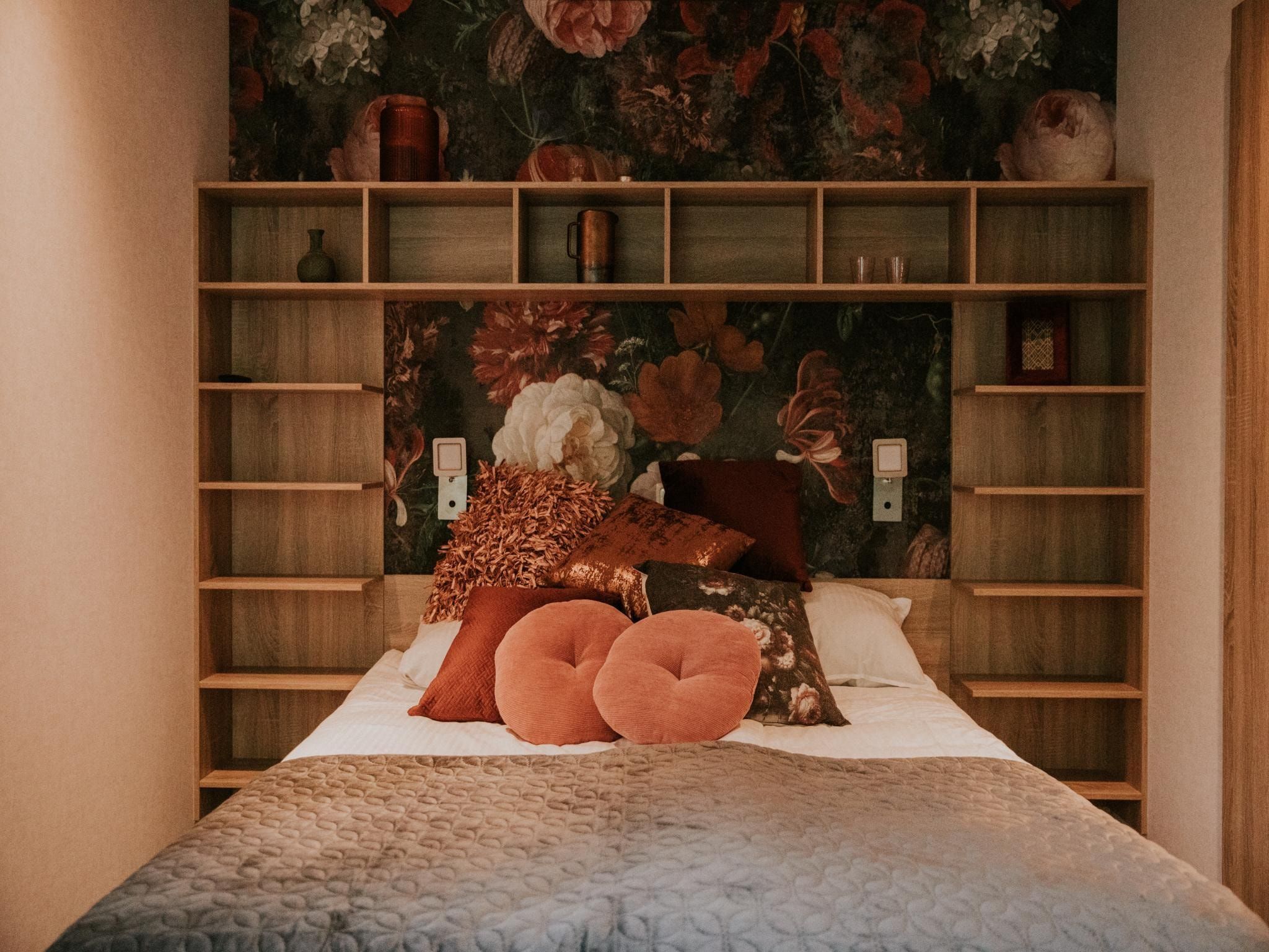 Een slaapkamer van Luxe loft  2 persoons in Balkbrug