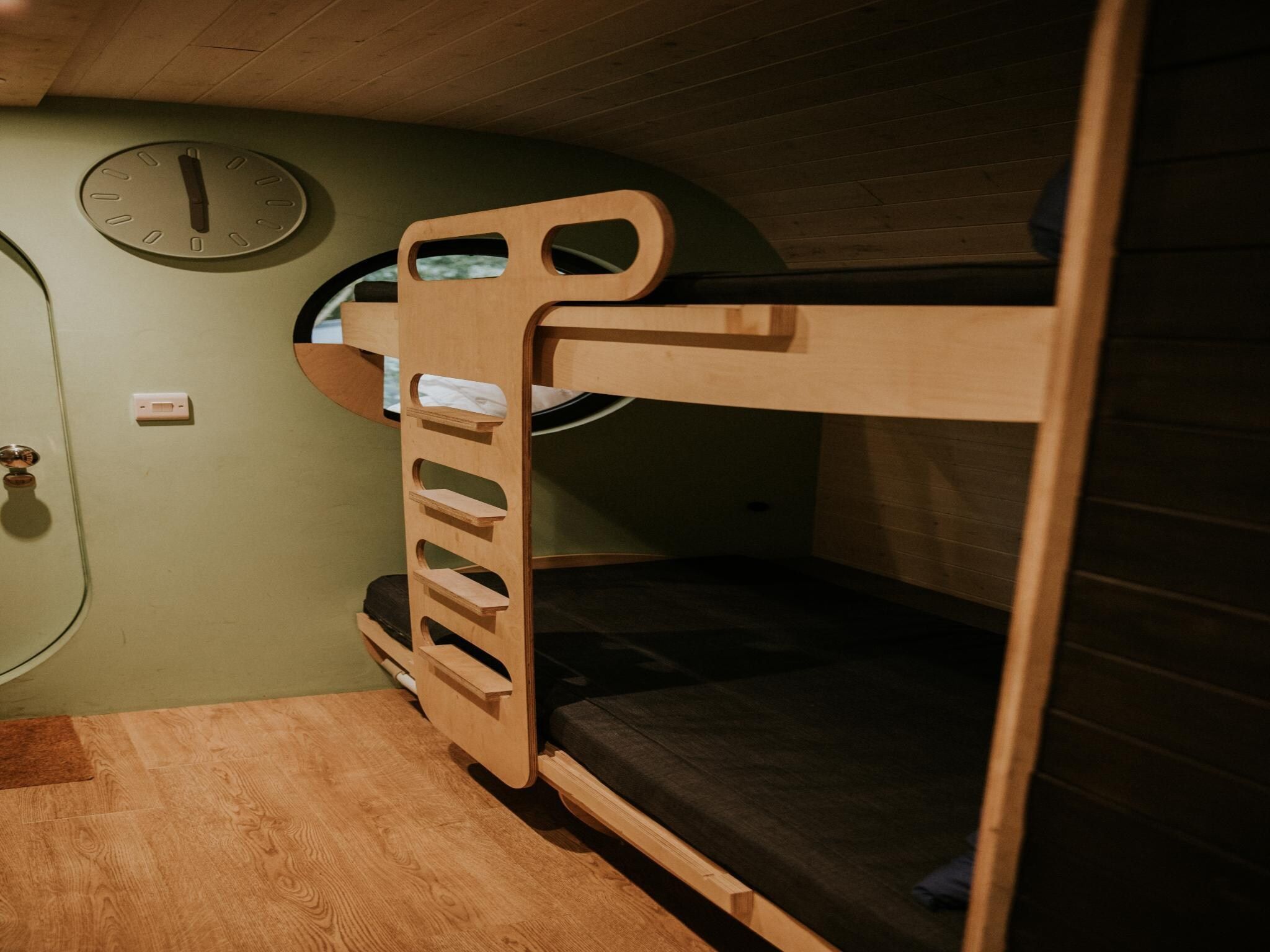 Een slaapkamer van Skycabin | 2-4 persoons in Balkbrug