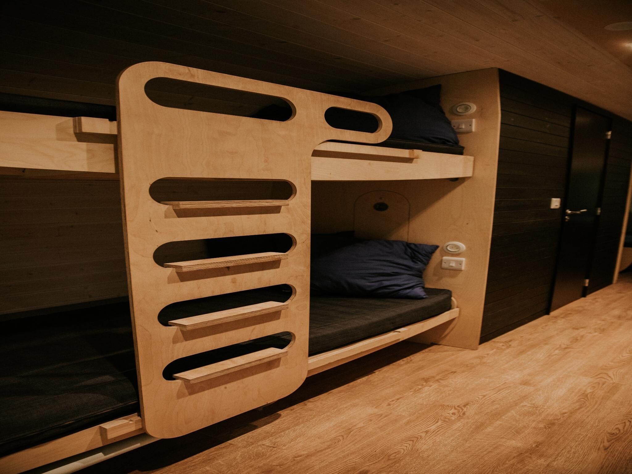 Een slaapkamer van Skycabin | 2-4 persoons in Balkbrug