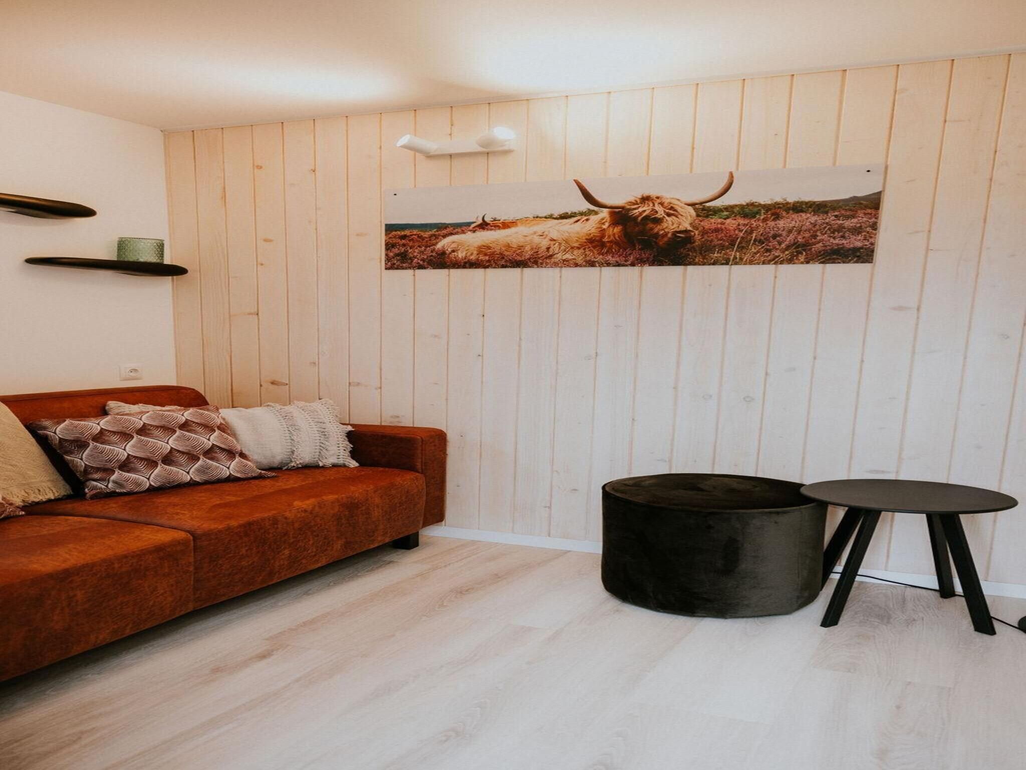 De woonkamer van Tiny house XL | 2-4 persoons in Balkbrug