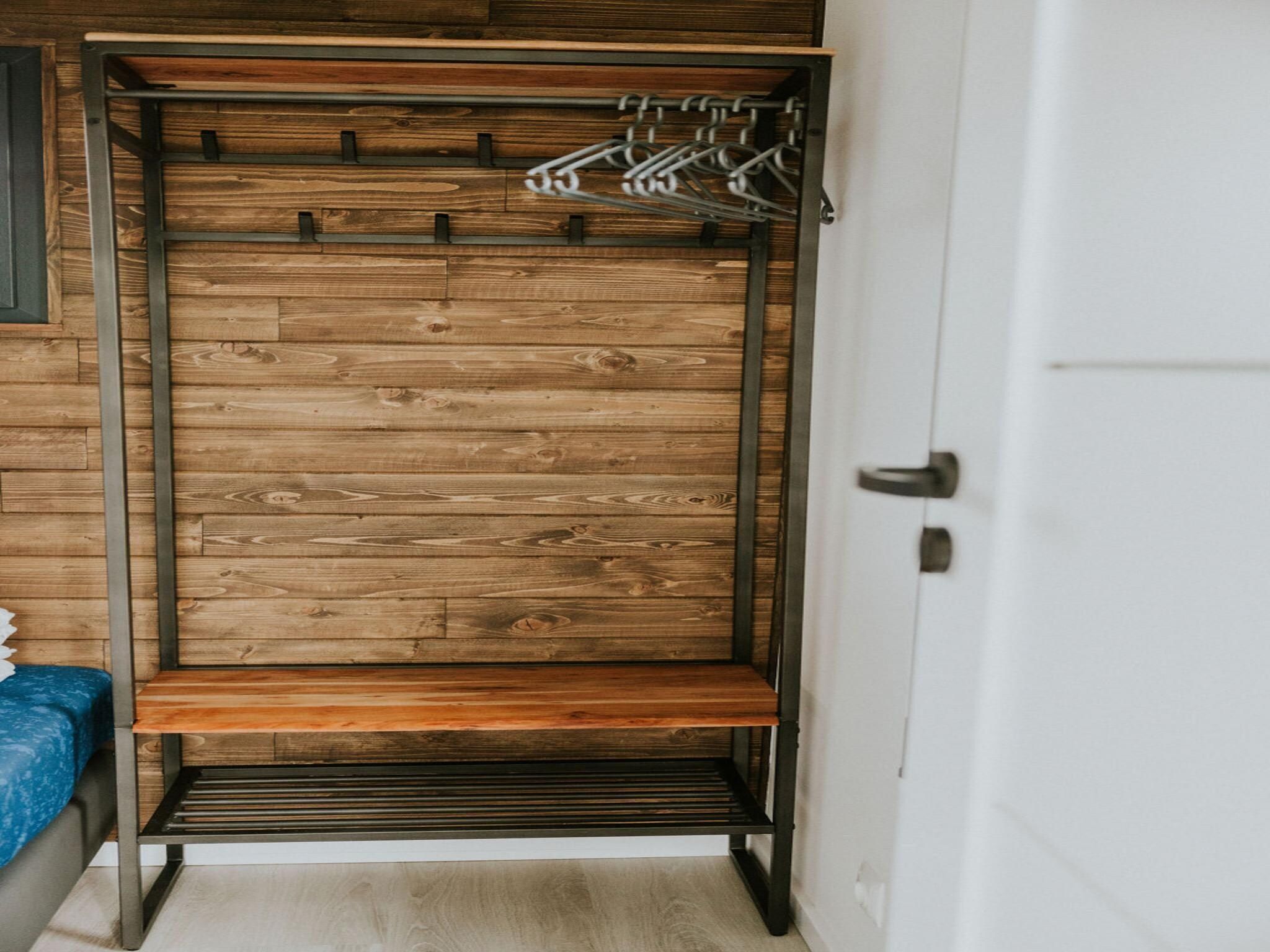 Een slaapkamer van Tiny house XL | 2-4 persoons in Balkbrug