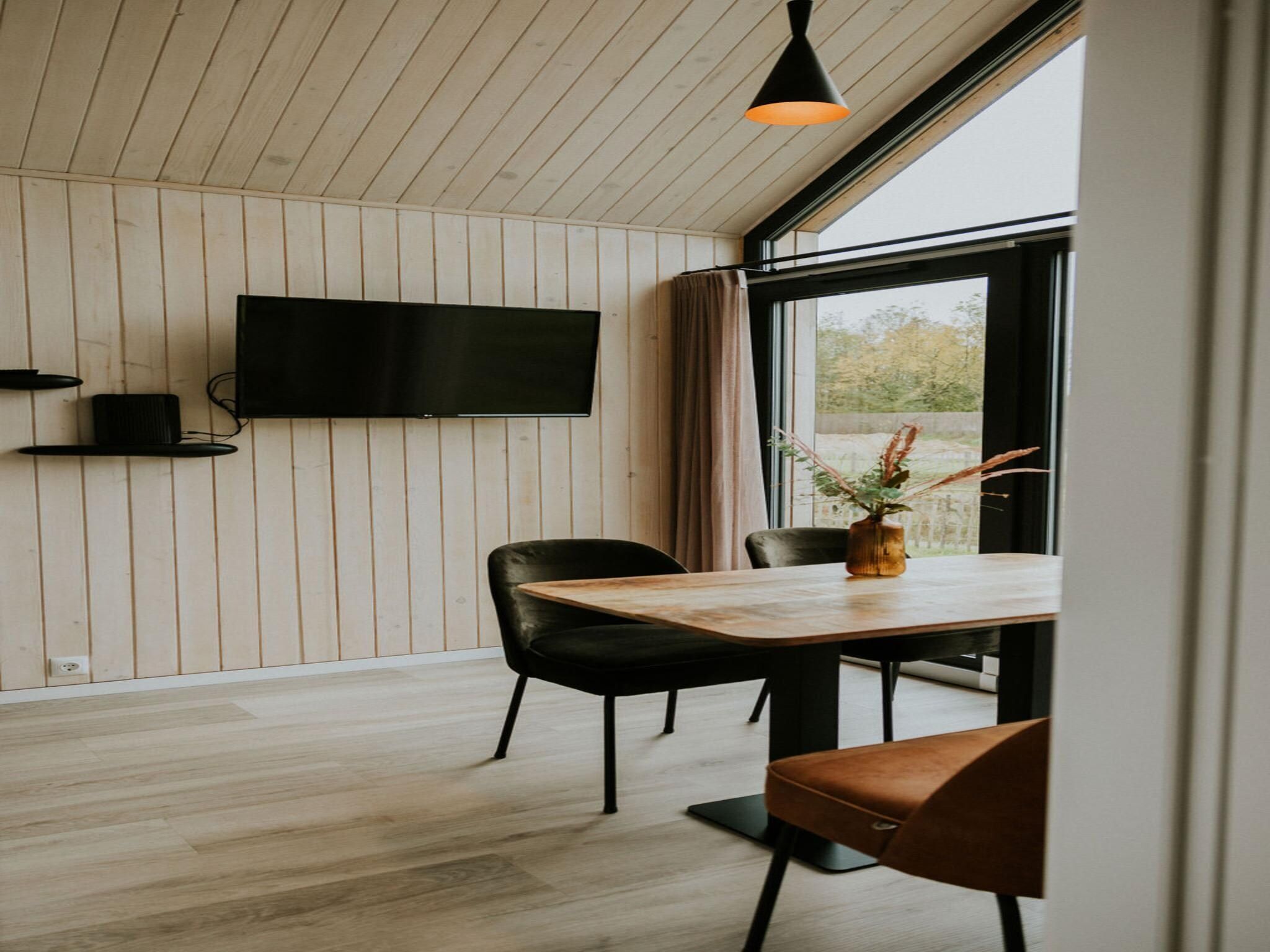 De woonkamer van Tiny house XL | 2-4 persoons in Balkbrug
