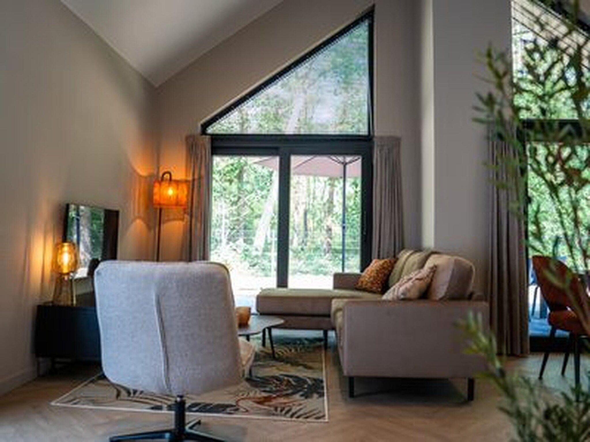 De woonkamer van Ecovilla Boszicht Luxe in Oirschot