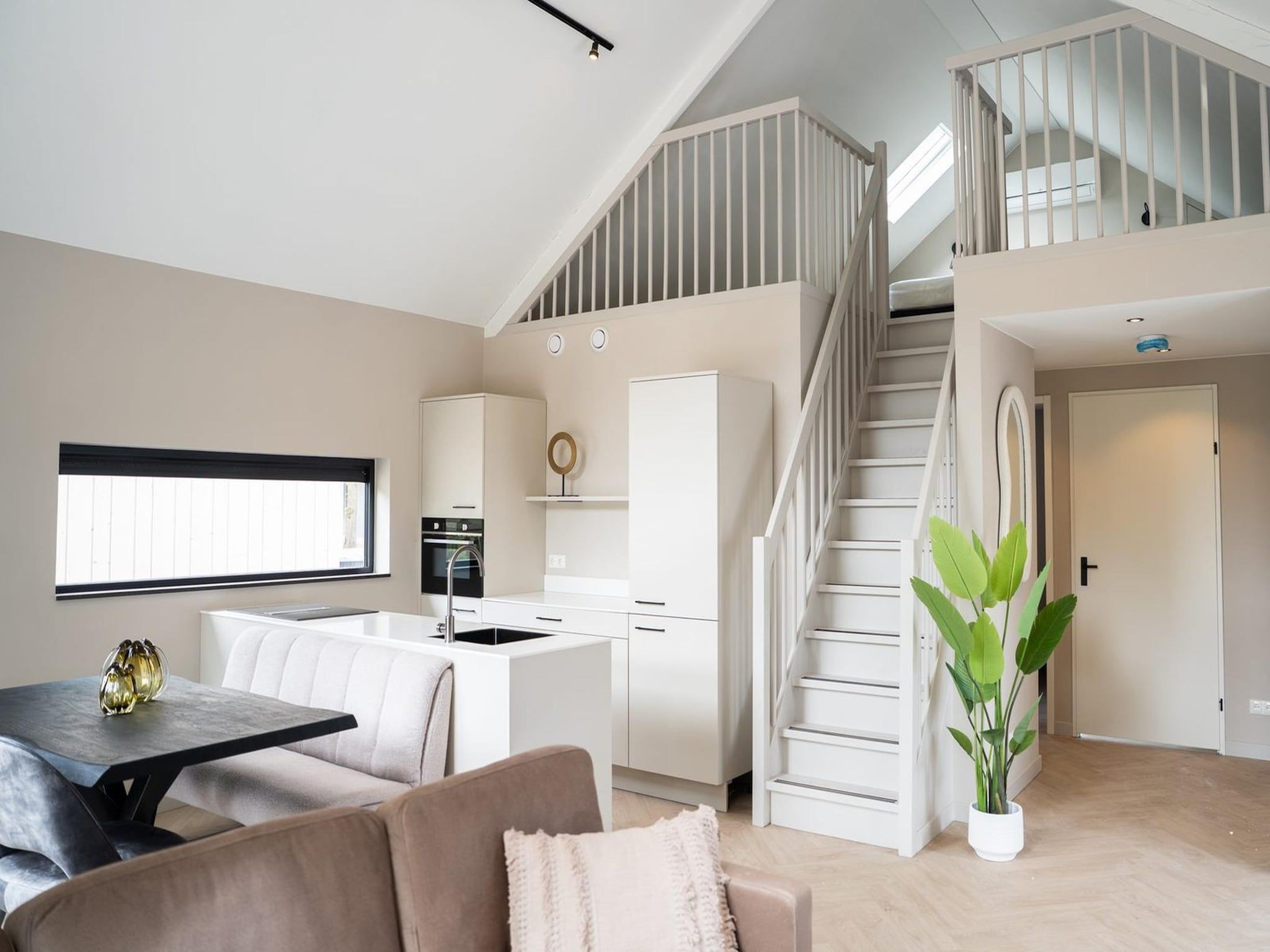 De woonkamer van Ecovilla Boszicht Luxe in Oirschot