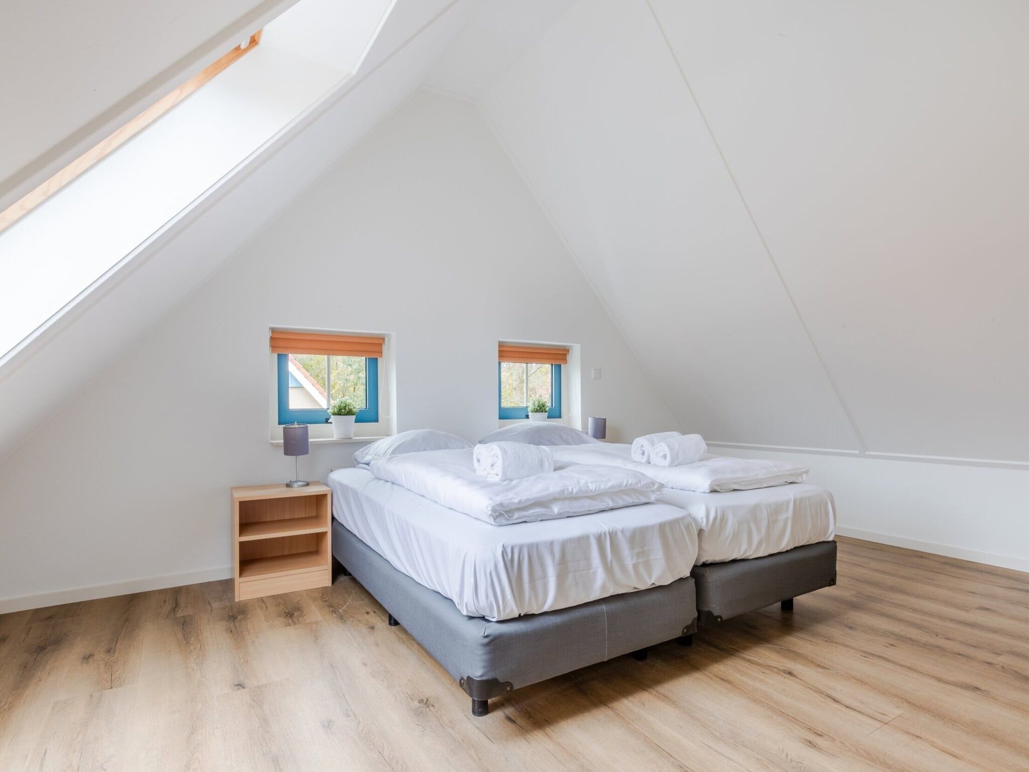 Een slaapkamer van Kustpark Texel 6 in De Koog