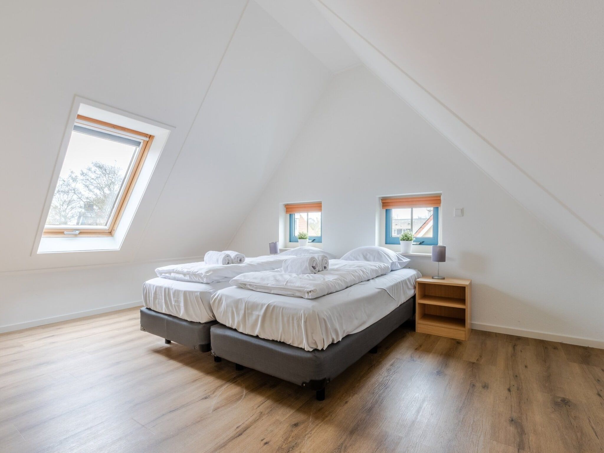 Een slaapkamer van Kustpark Texel 6 in De Koog