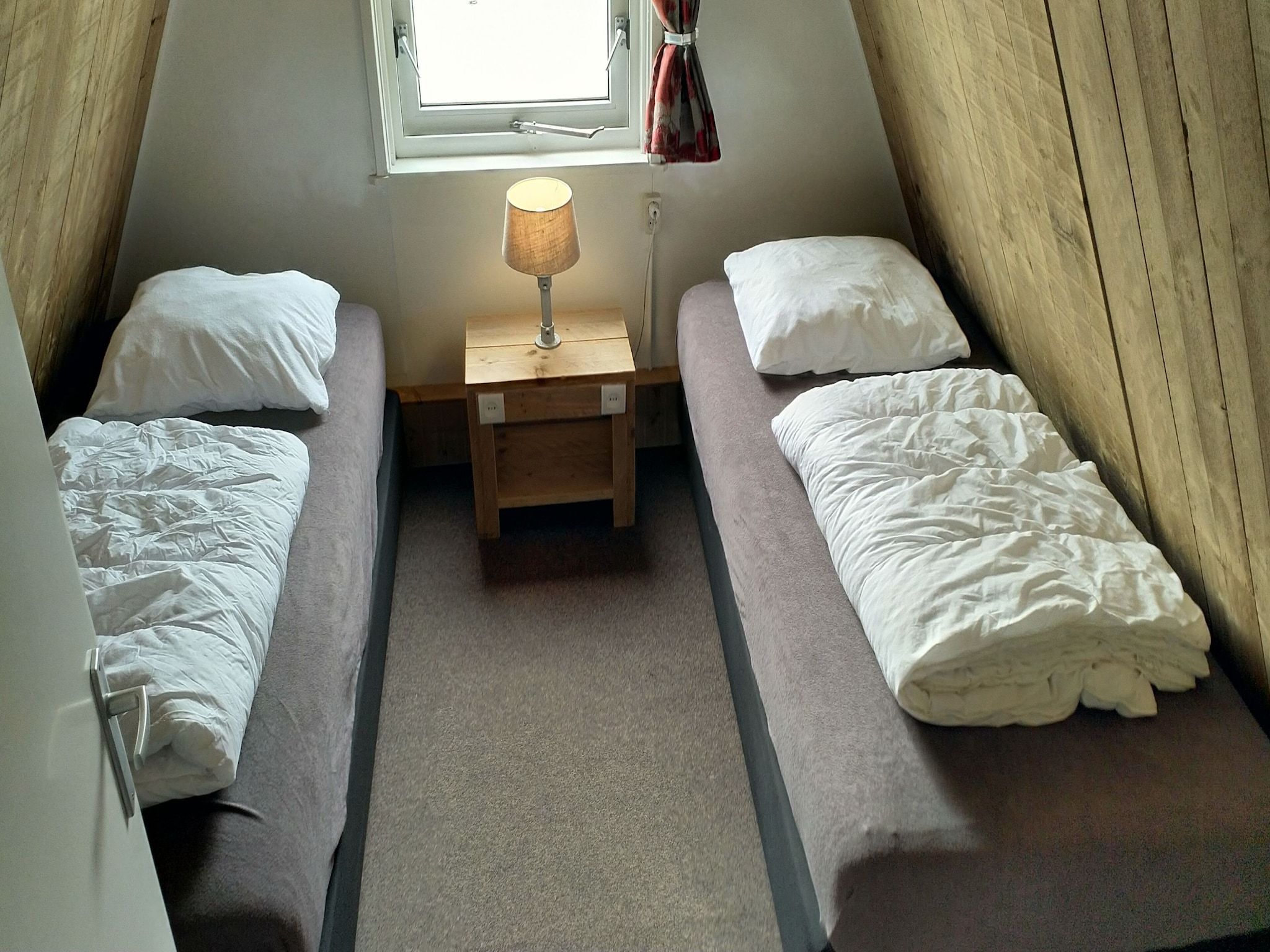 Een slaapkamer van Vakantiepark Eigen Wijze 1 in Bant