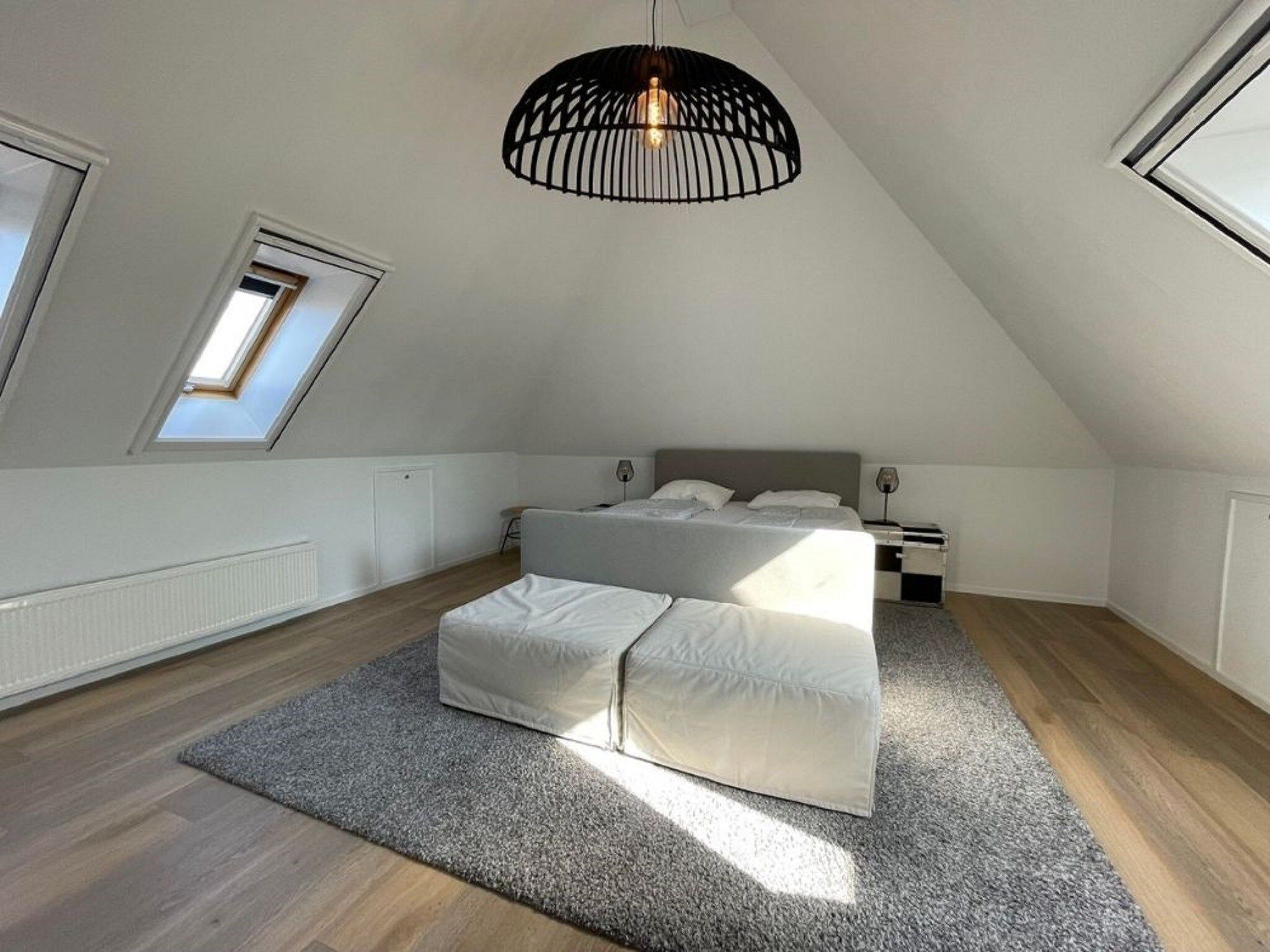 Een slaapkamer van Landgoed Eysinga State 1 in Sint Nicolaasga