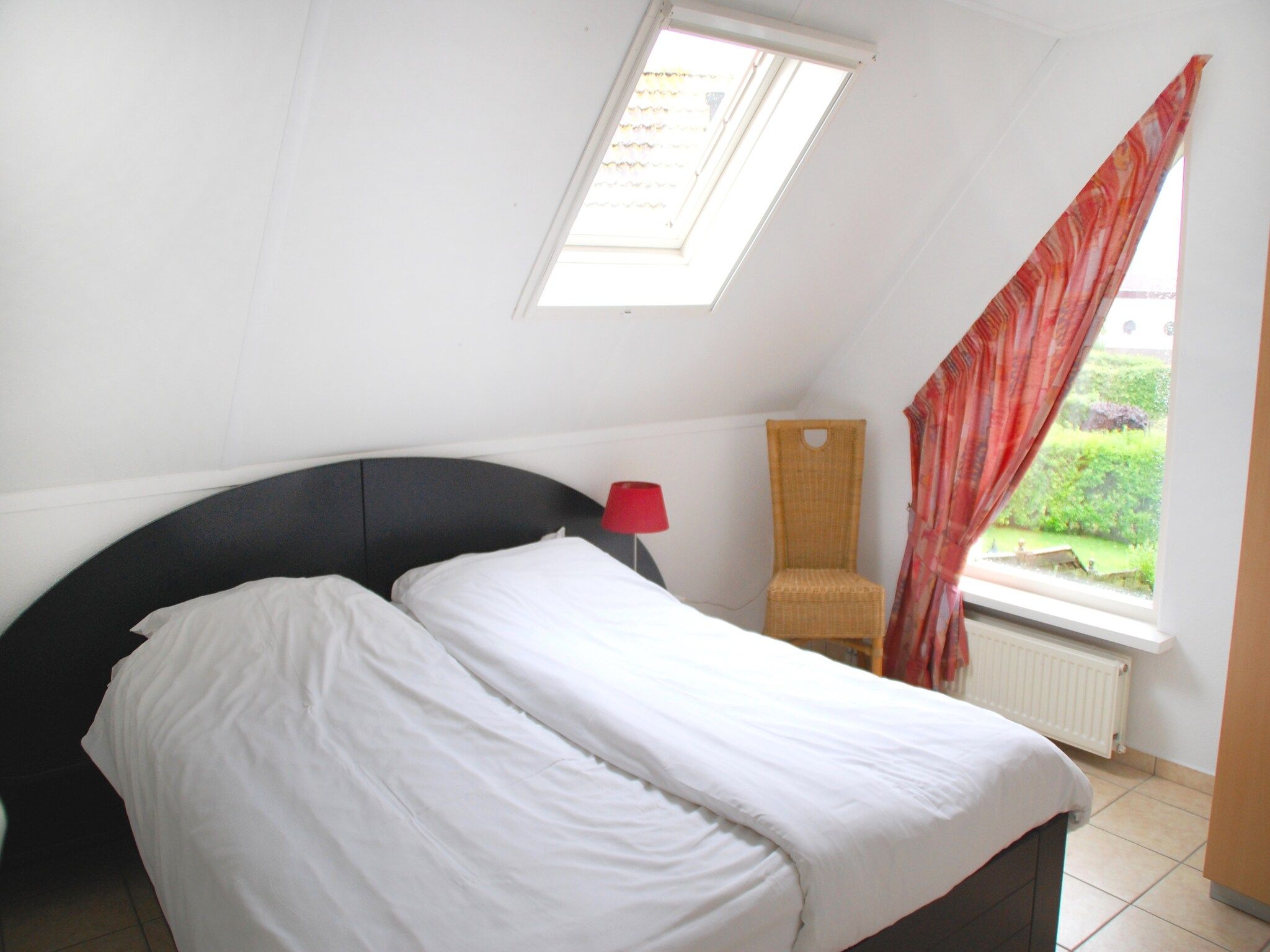 Een slaapkamer van Waterwoning 6 in Medemblik