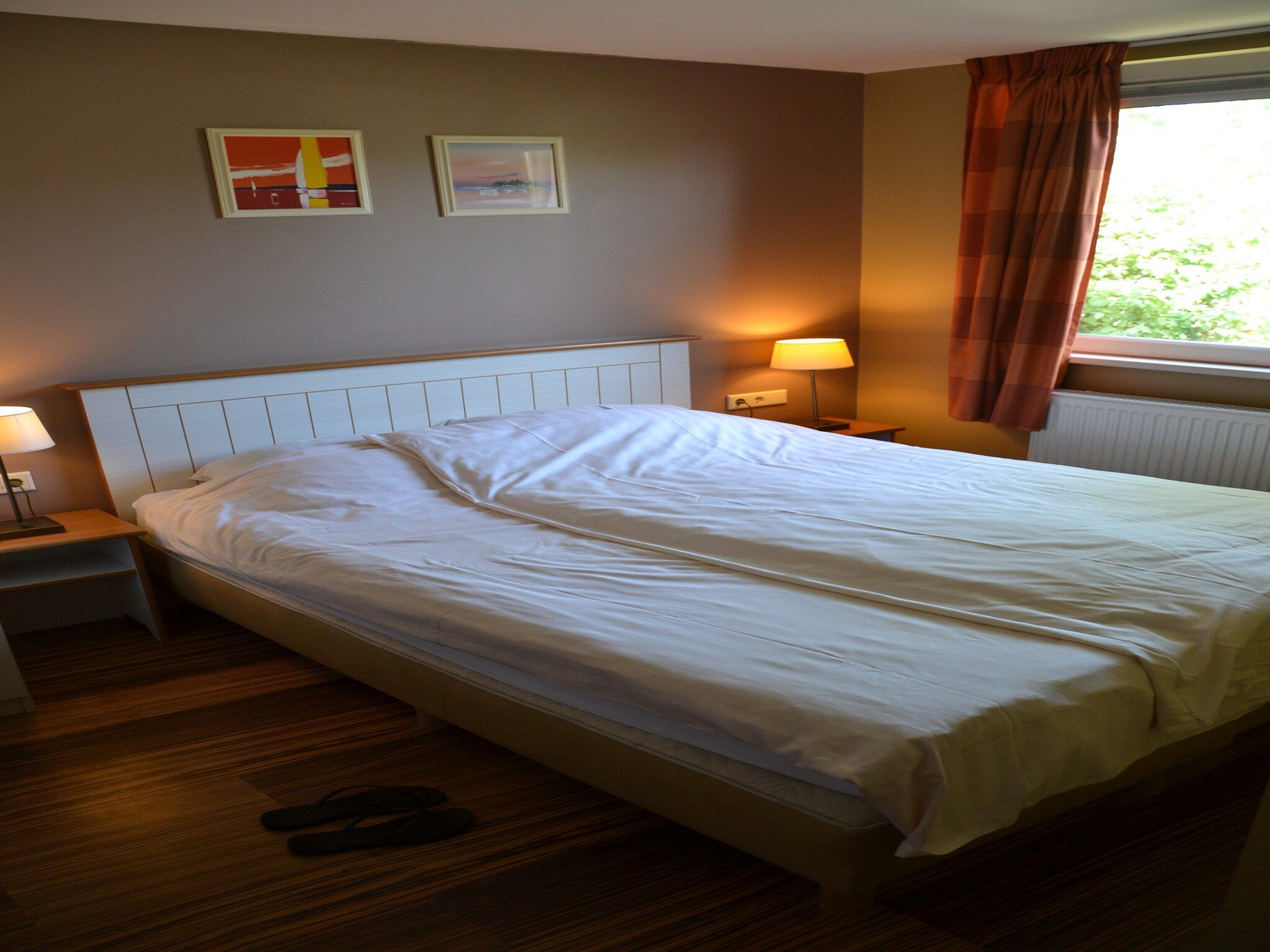 Een slaapkamer van Strandpark Vlugtenburg 3 in 's-Gravenzande