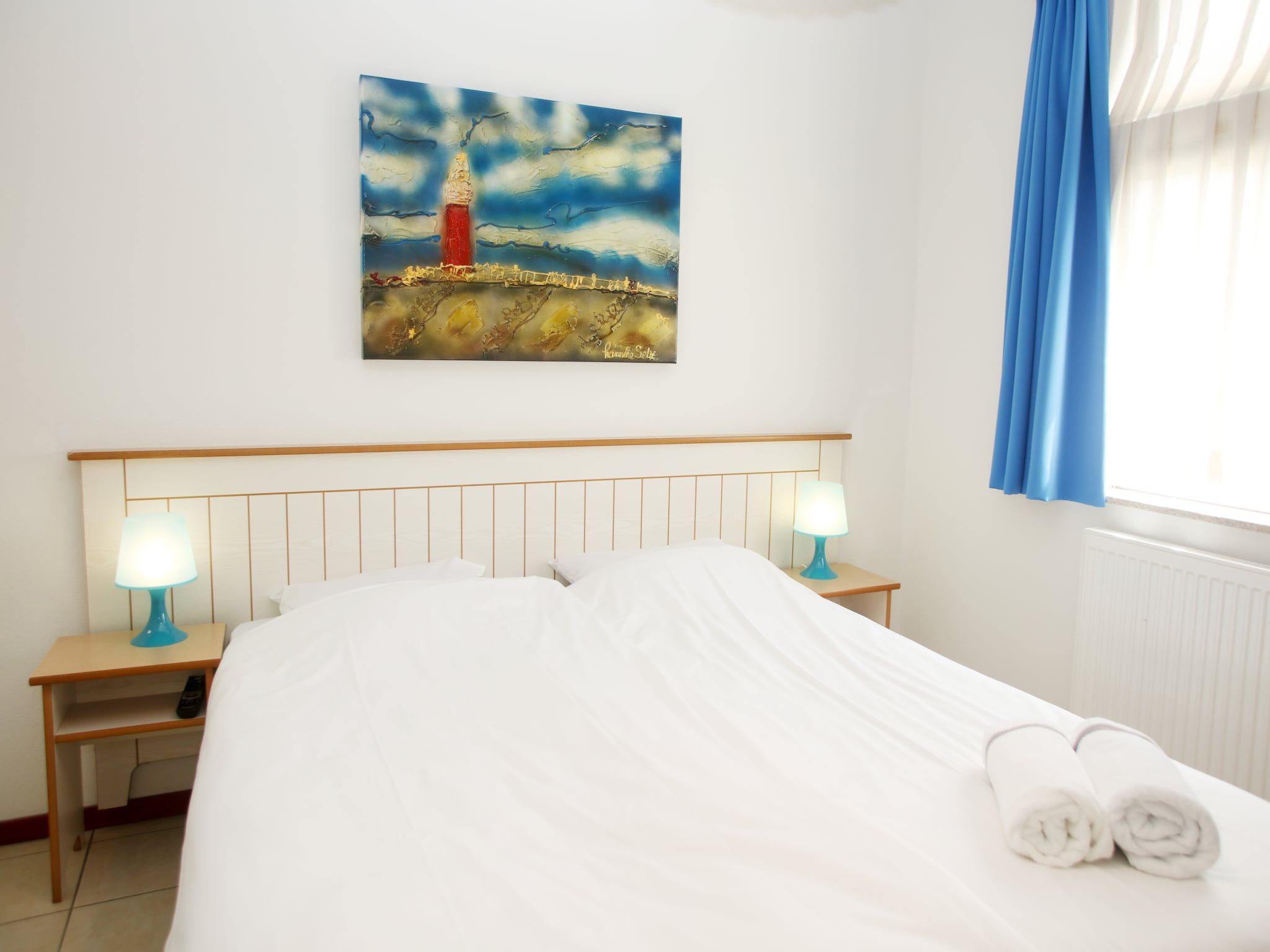 Een slaapkamer van Kustpark Texel 2 in De Koog