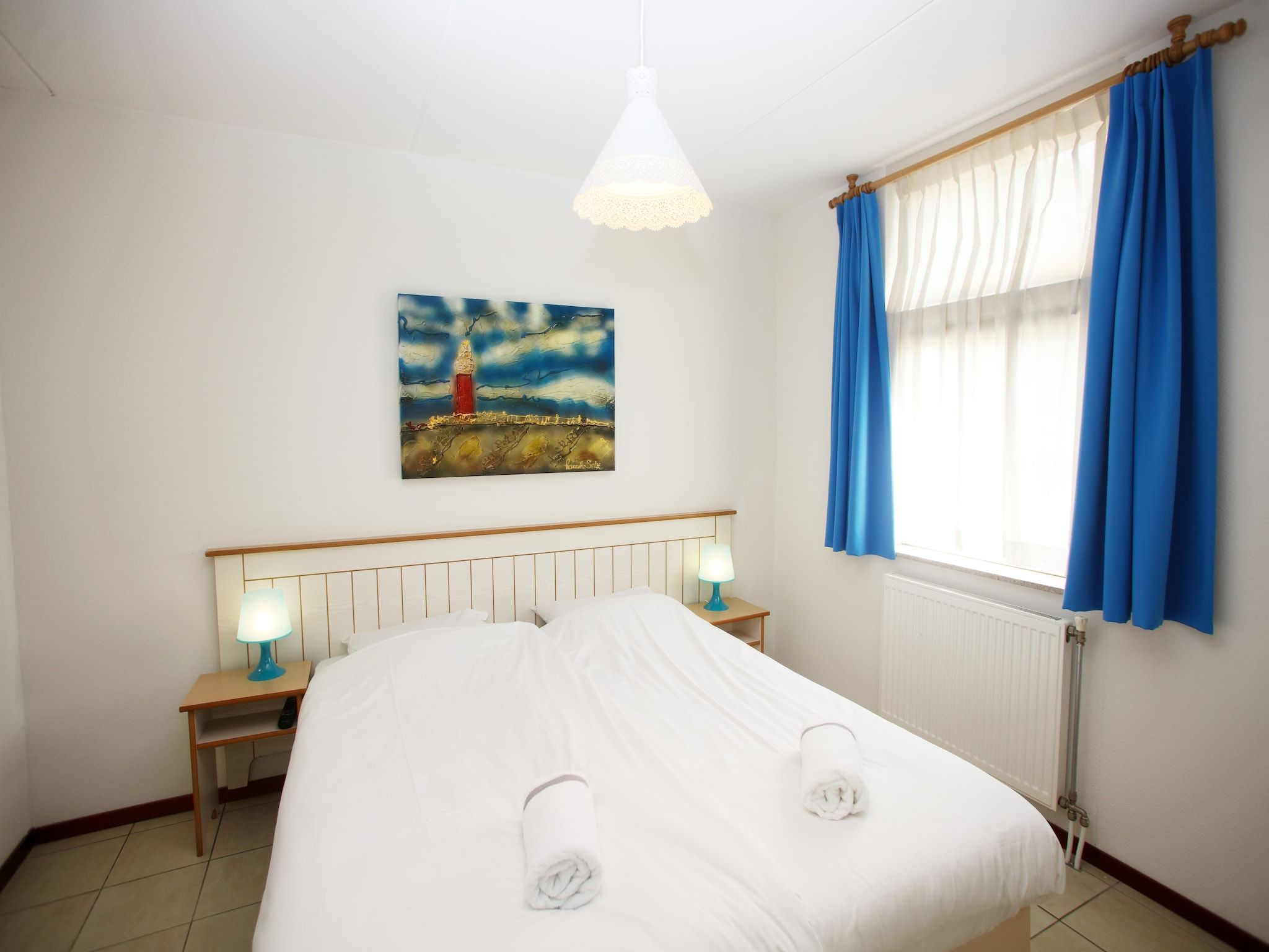 Een slaapkamer van Kustpark Texel 2 in De Koog