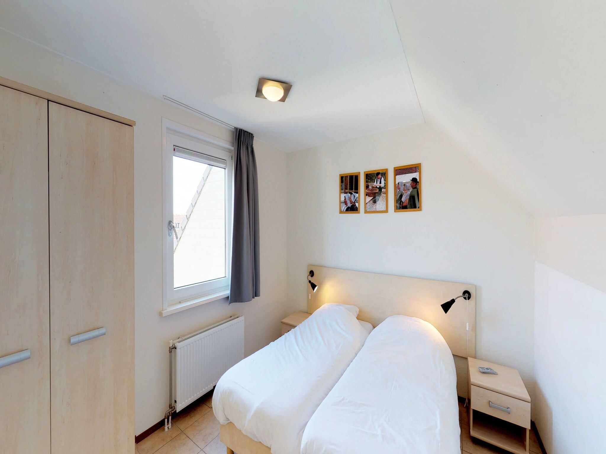 Een slaapkamer van Villapark de Paardekreek 6 in Kortgene