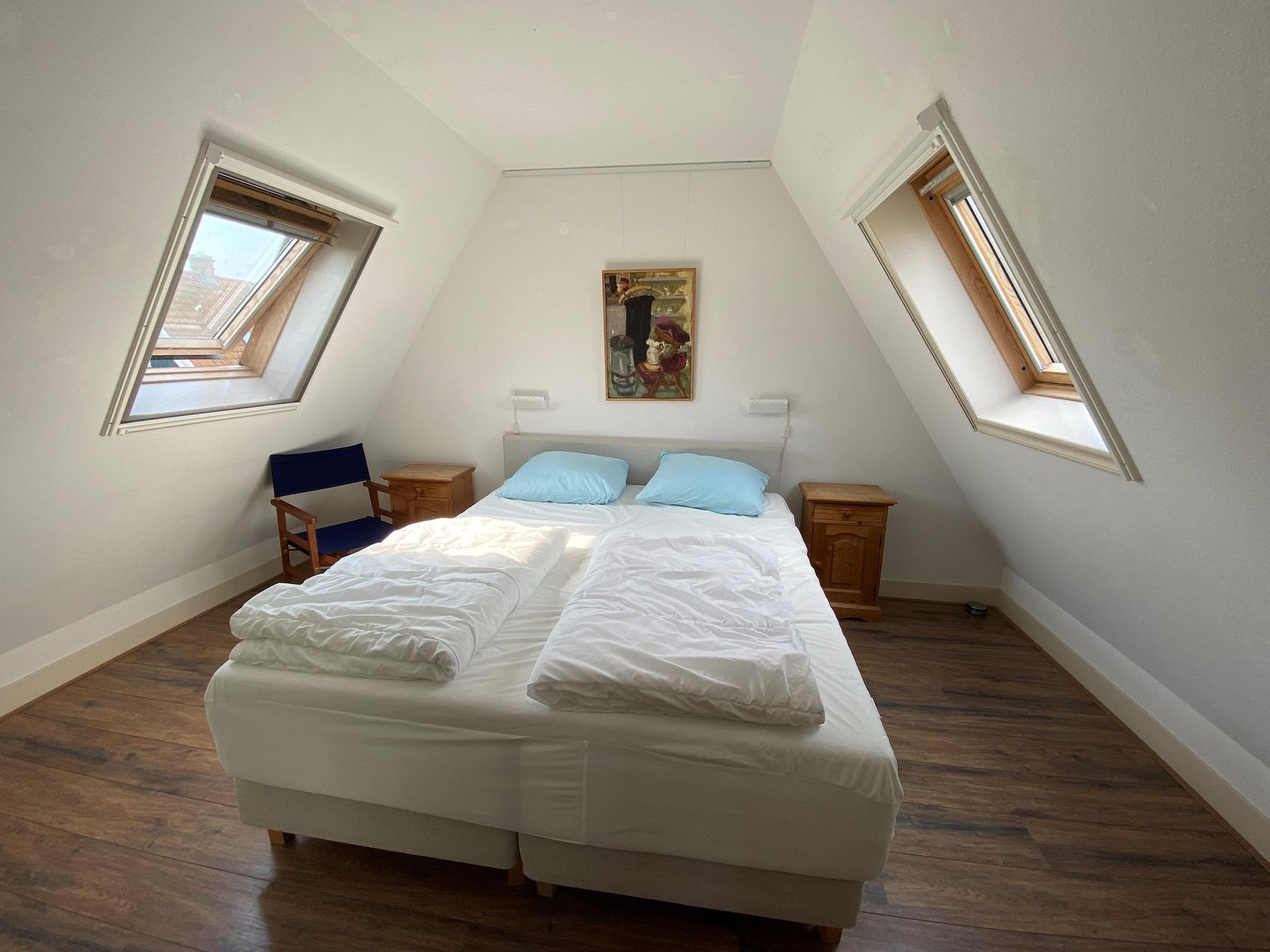 Een slaapkamer van Recreatiepark Wiringherlant  - Villa 10 in Hippolytushoef