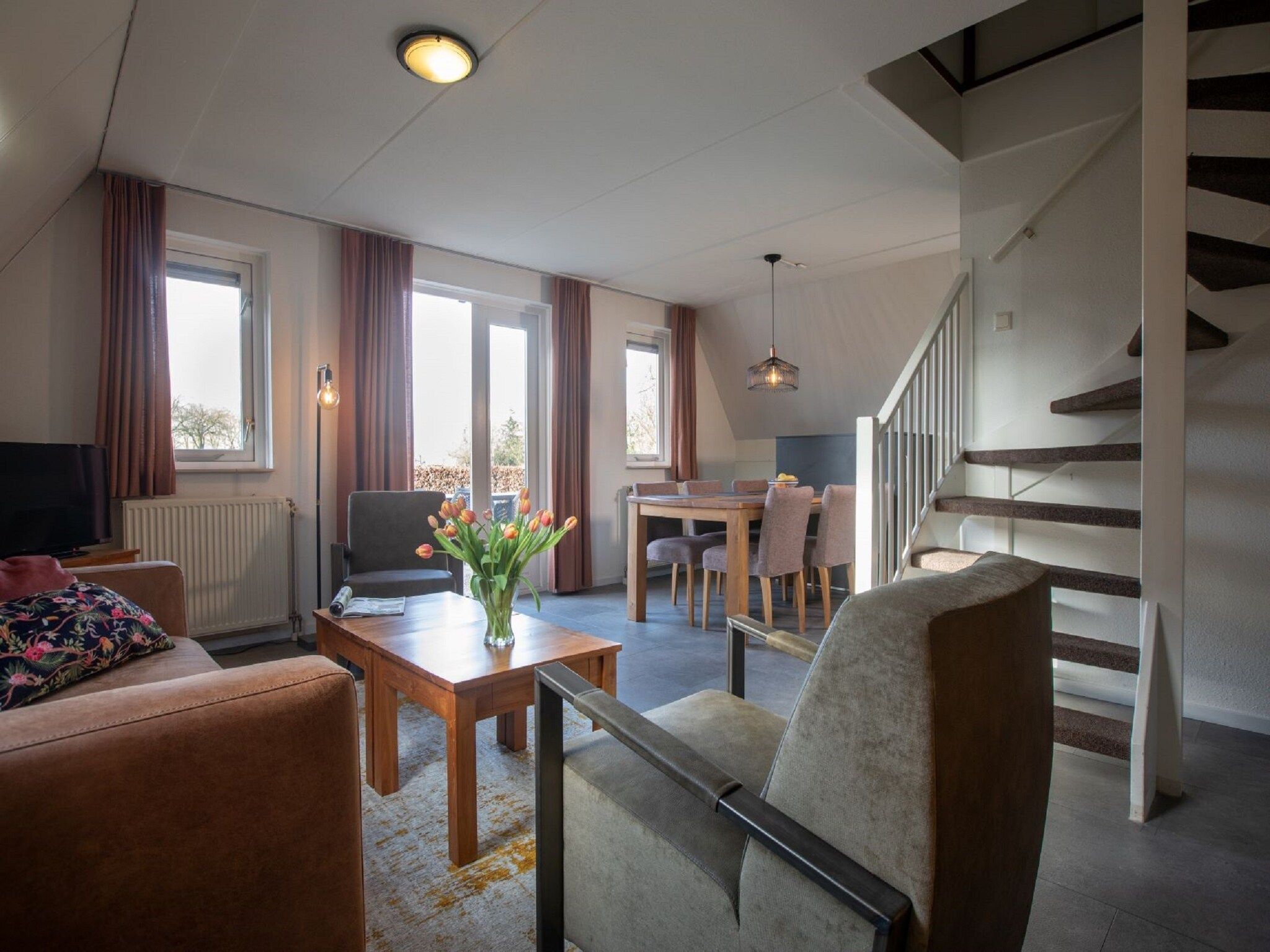 De woonkamer van Vakantie bij Meeussen - Molendal 1 in Plasmolen