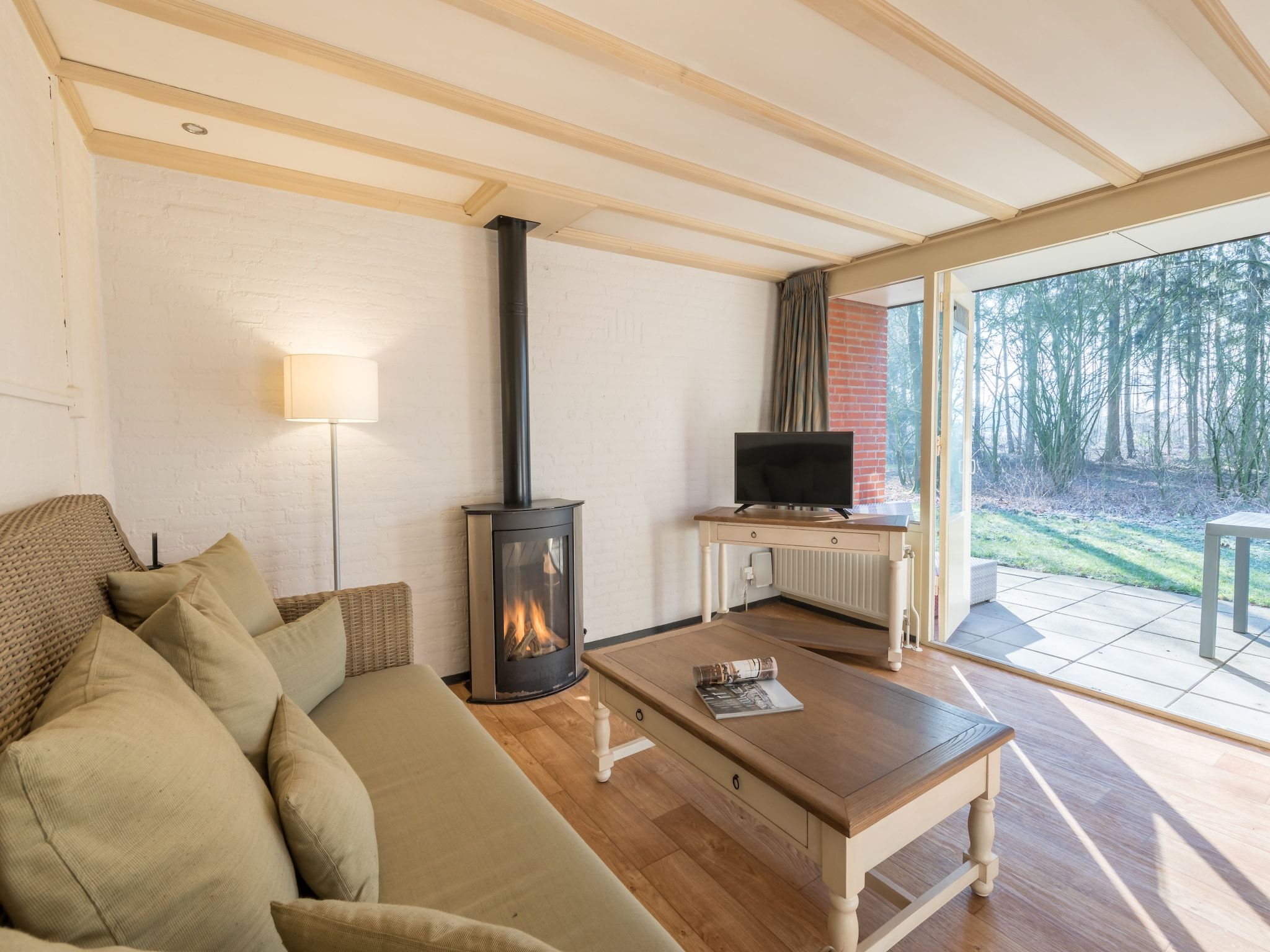 De woonkamer van Vakantiepark Klein Vink 14 in Arcen