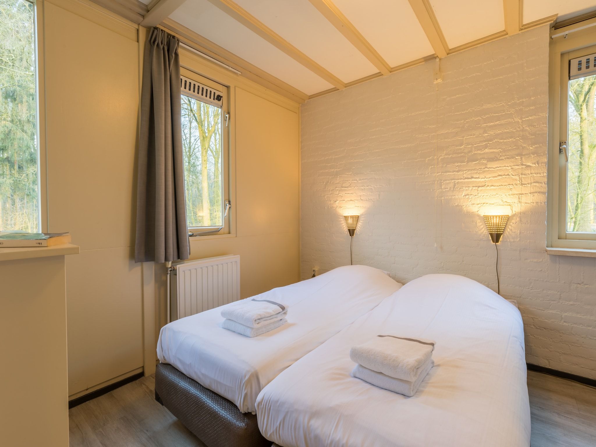 Een slaapkamer van Vakantiepark Klein Vink 13 in Arcen