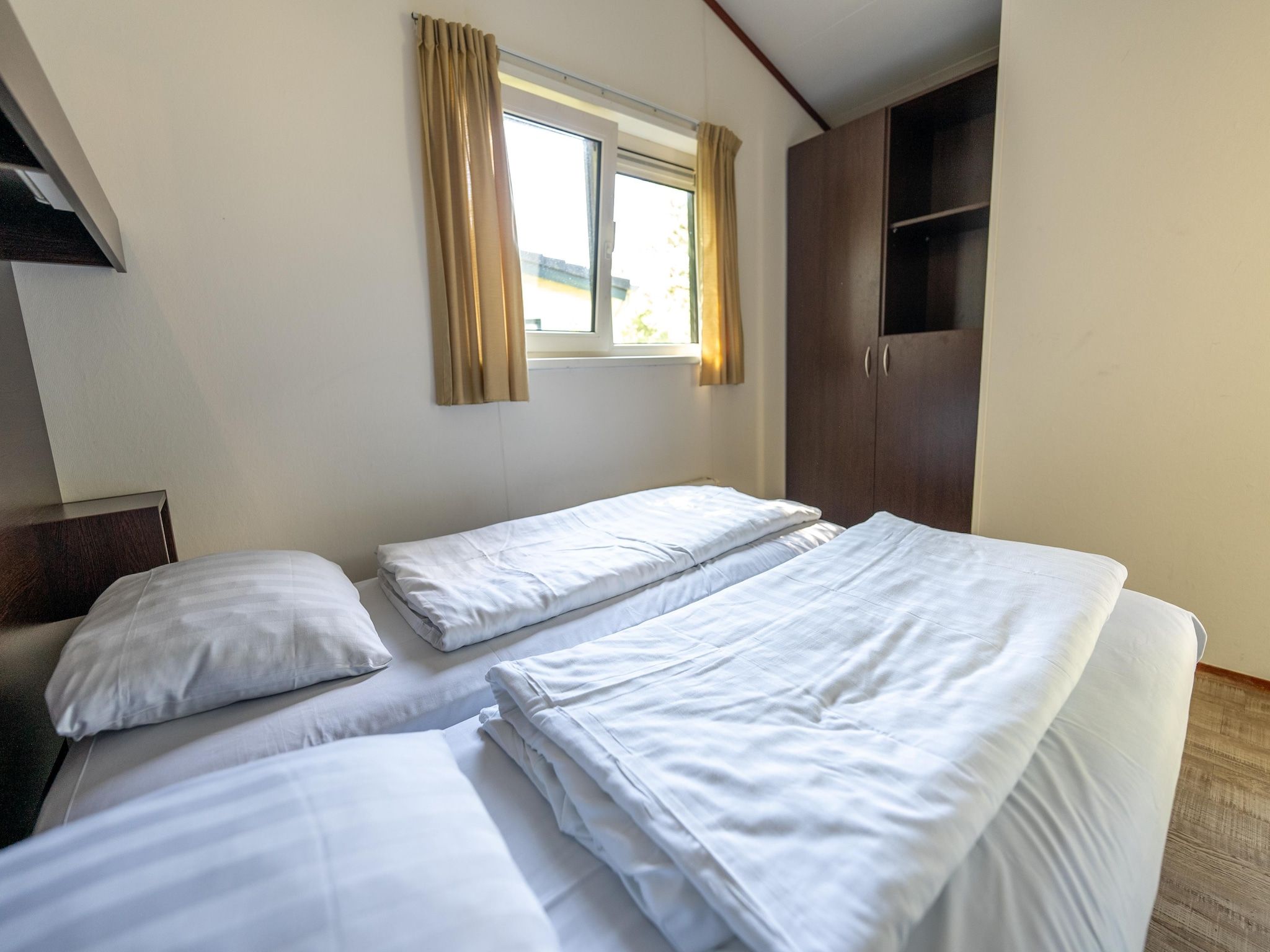 Een slaapkamer van Kustpark Egmond aan Zee 4 in Egmond aan zee