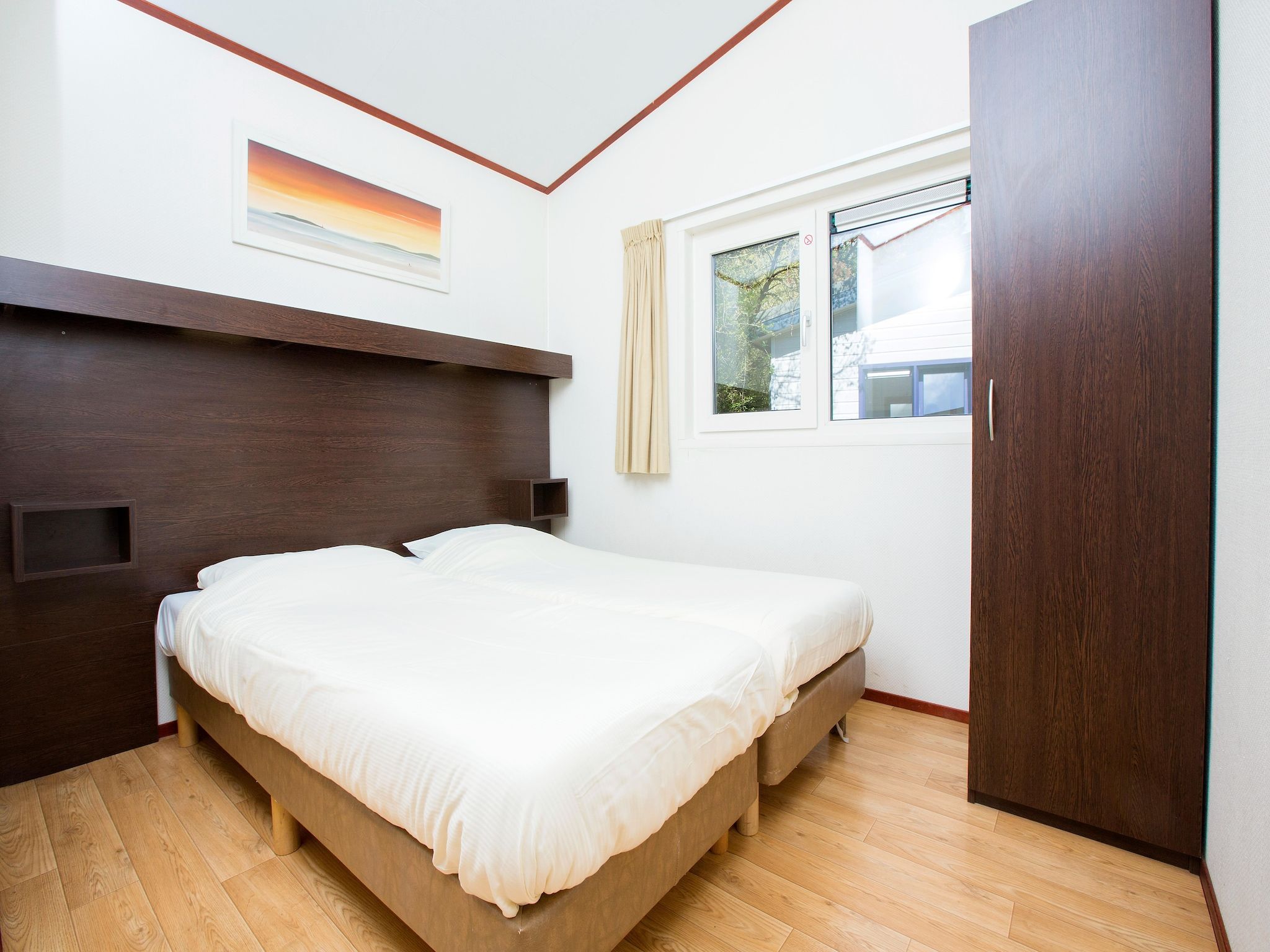 Een slaapkamer van Kustpark Egmond aan Zee 1 in Egmond aan zee