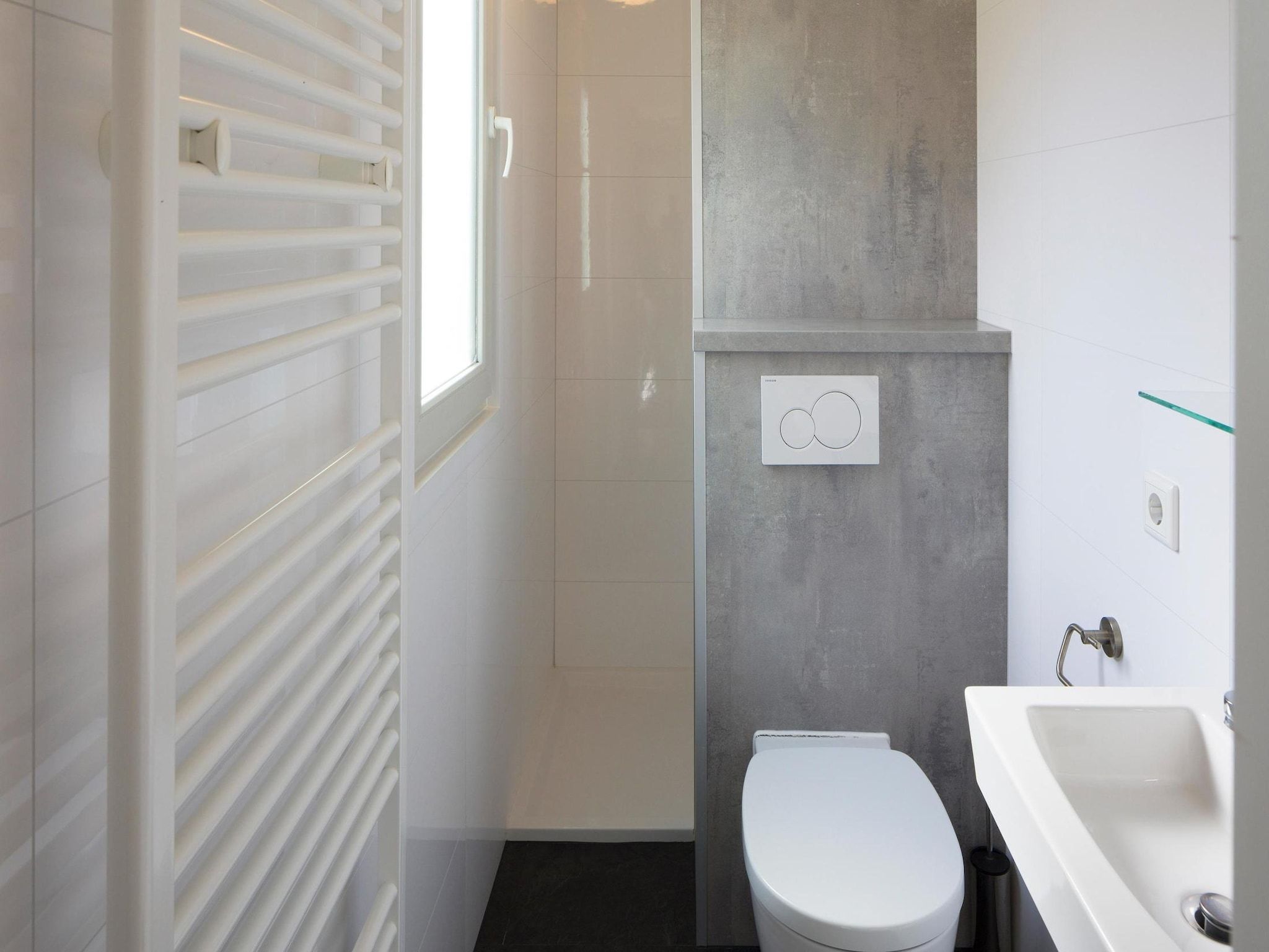 De badkamer van Vakantiepark Beach Resort 2 in Kamperland