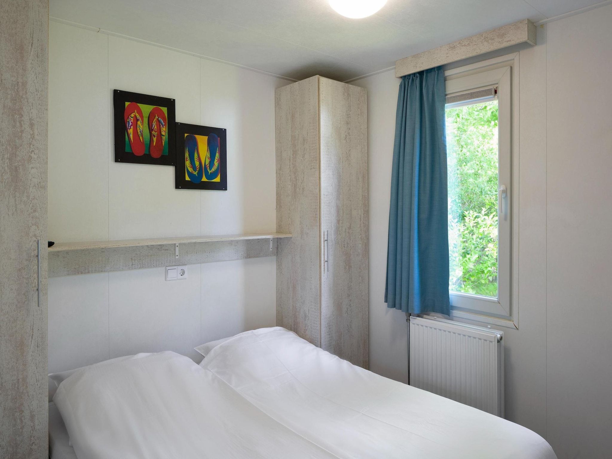 Een slaapkamer van Vakantiepark Beach Resort 2 in Kamperland