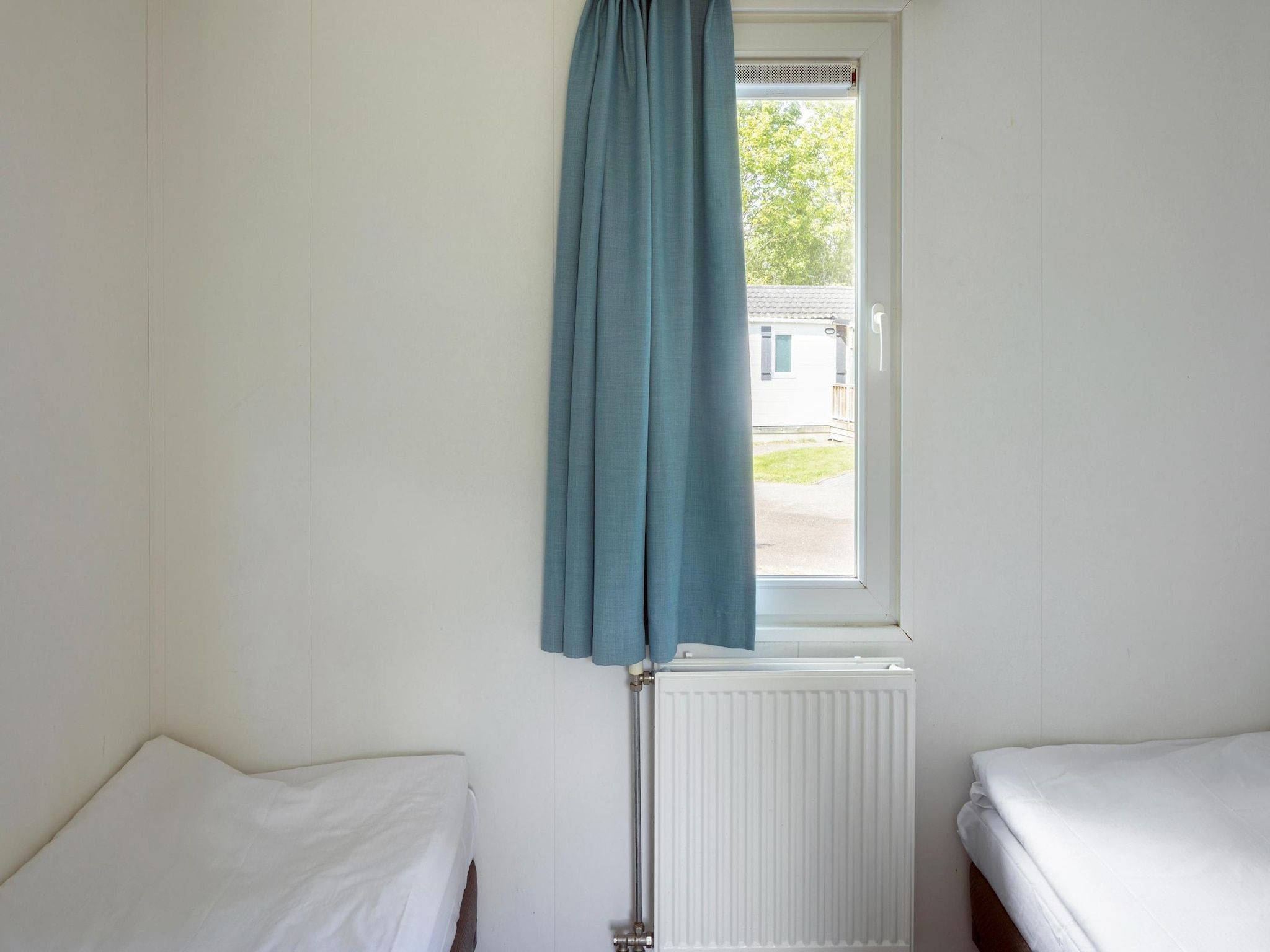 Een slaapkamer van Vakantiepark Beach Resort 2 in Kamperland