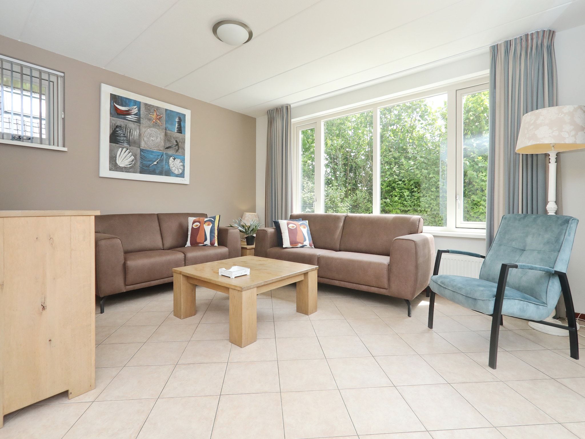 De woonkamer van Vakantiepark Duinrust 1 in Noordwijk aan zee