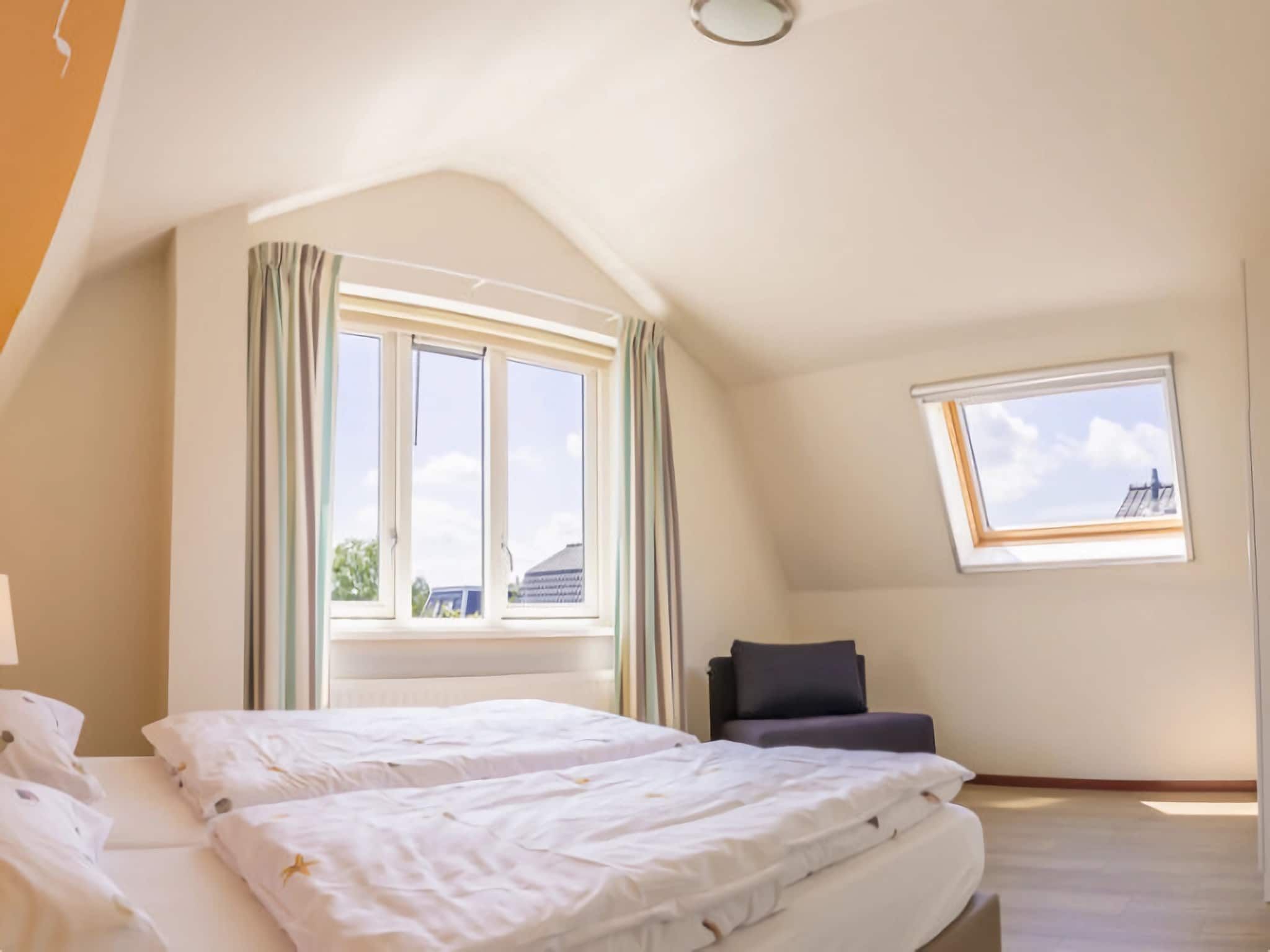 Een slaapkamer van Vakantiepark Duinrust 1 in Noordwijk aan zee