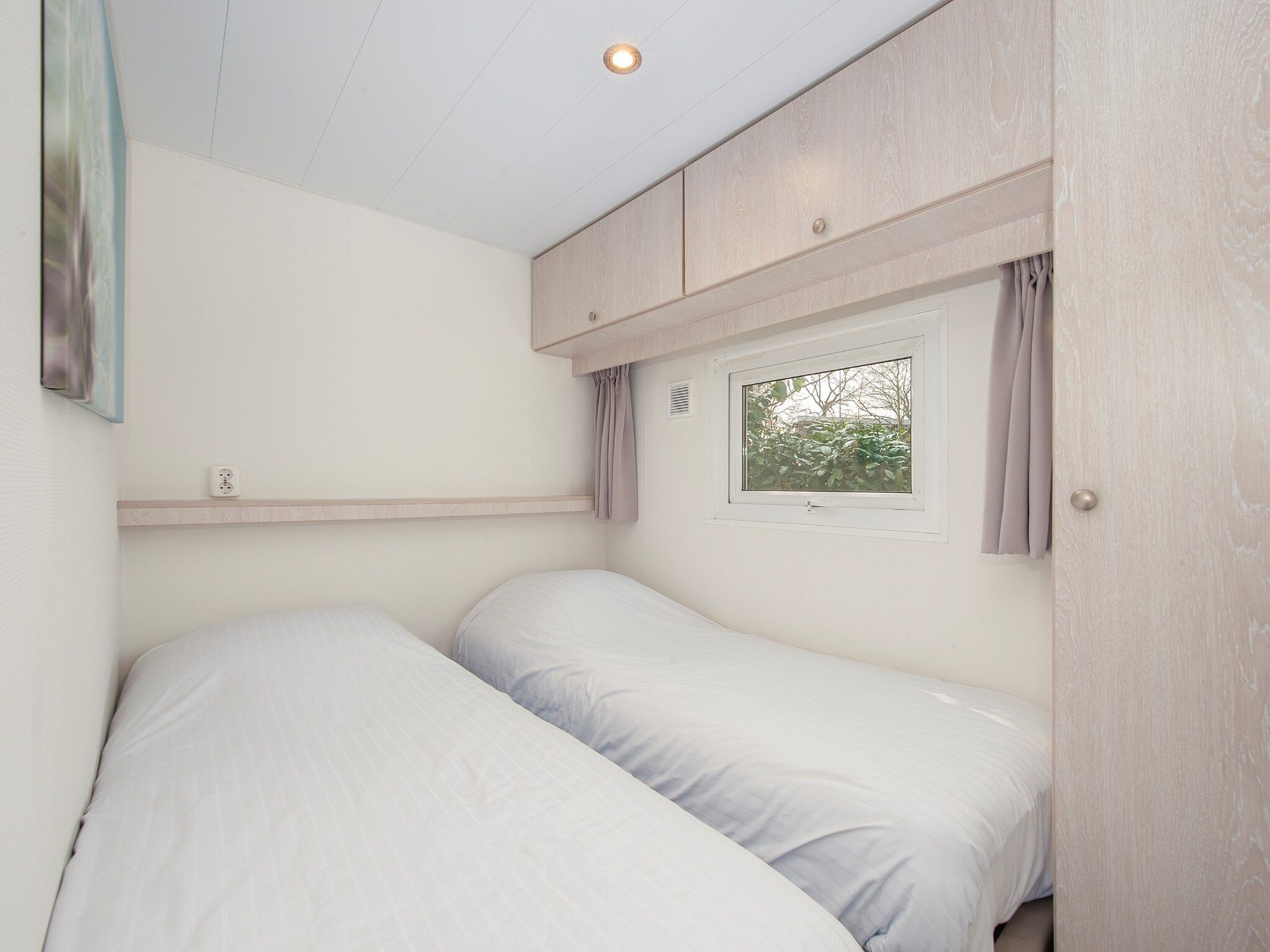 Een slaapkamer van Resort Arcen 15 in Arcen