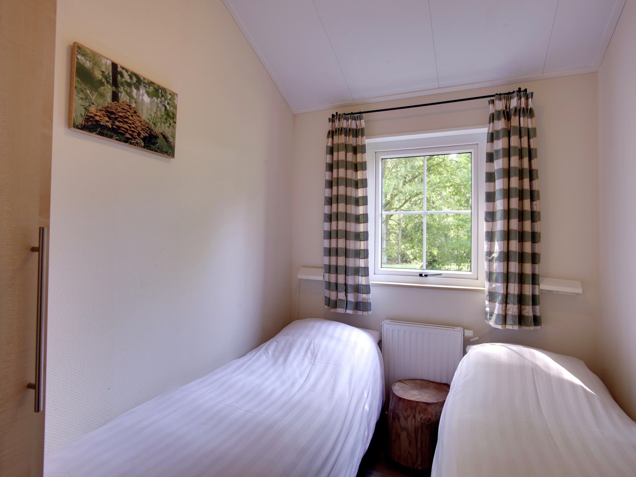 Een slaapkamer van Buitenplaats Gerner 4 in Dalfsen