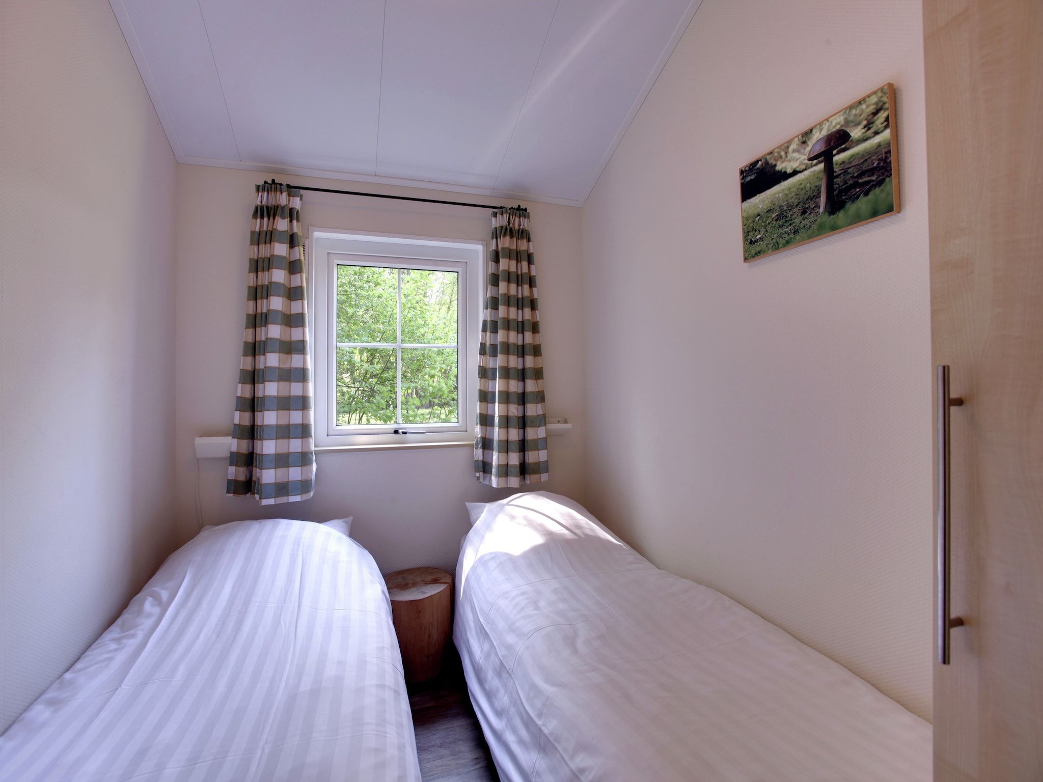 Een slaapkamer van Buitenplaats Gerner 4 in Dalfsen