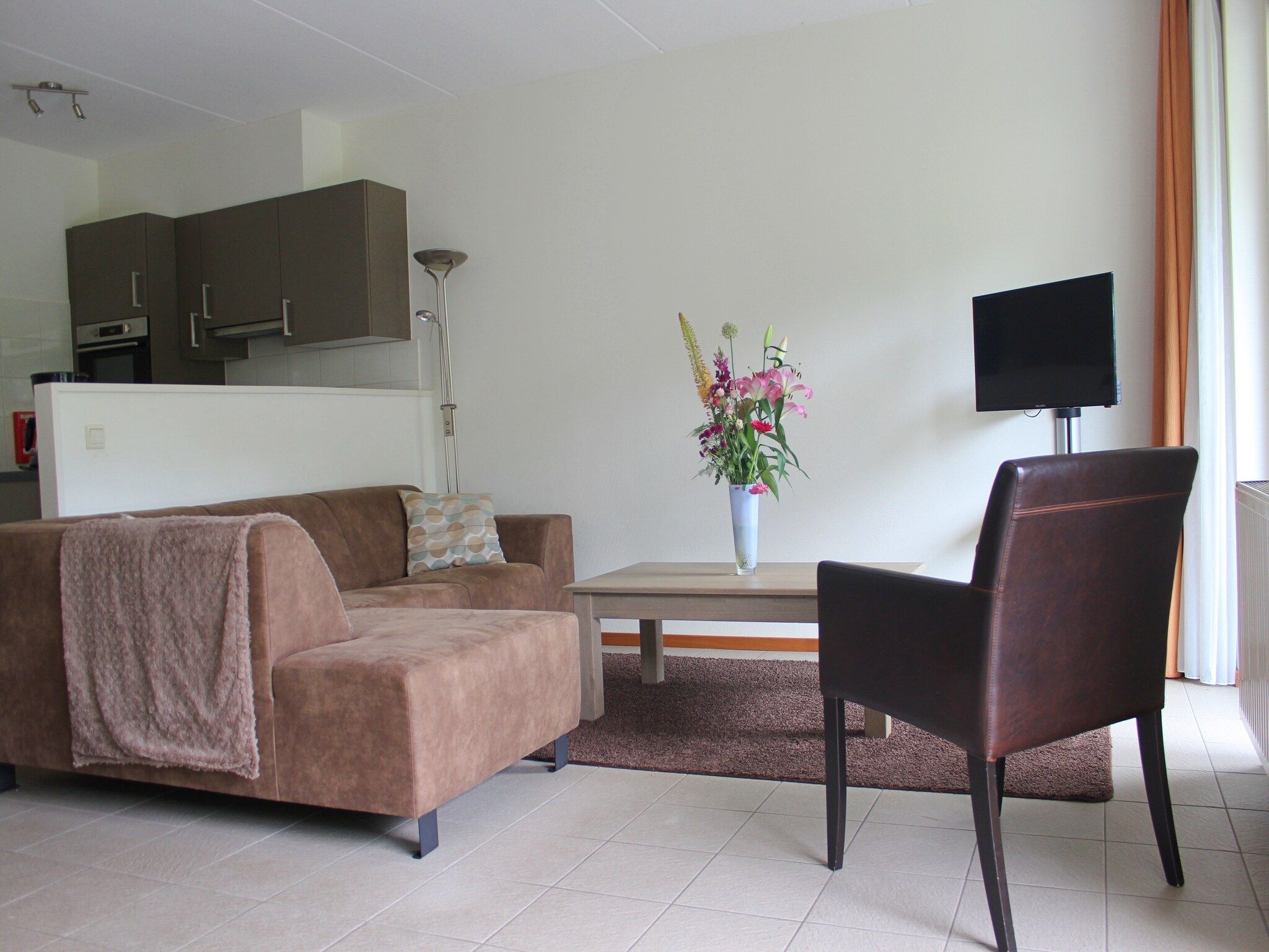 De woonkamer van Vakantiepark Horsetellerie 1 in Hardenberg (rheezerveen)